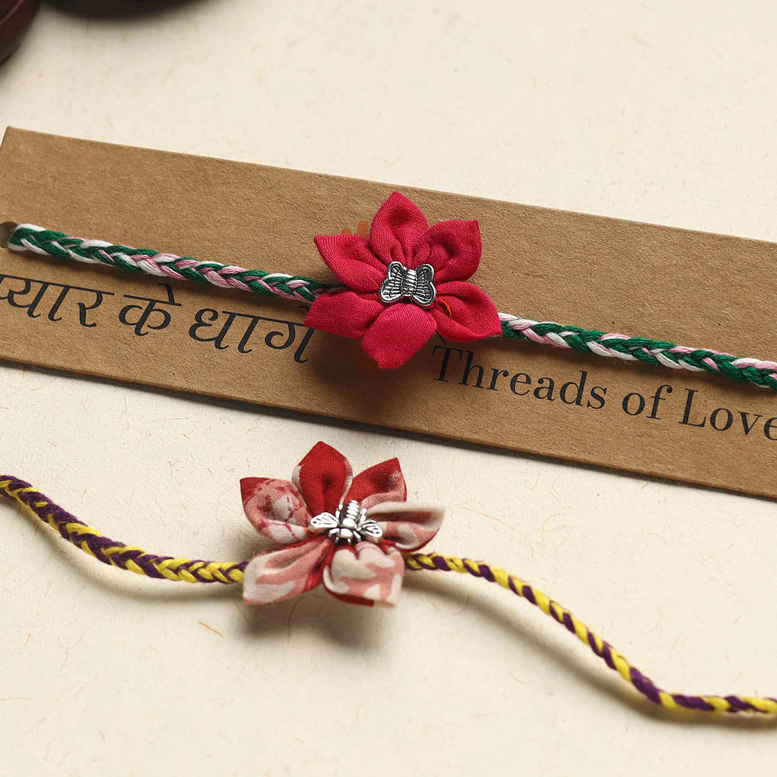 Handmade Fabric Flower Rakhi (Assorted Set of 2)