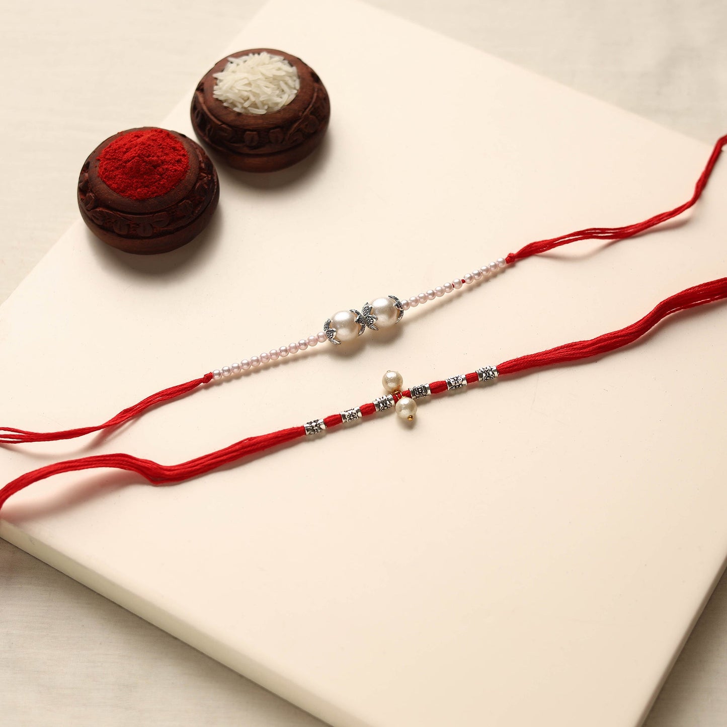 Handmade German Silver Pearl Rakhi & Lumba Set