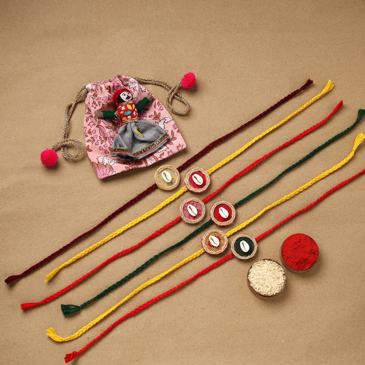 Handmade jute fabart shell work rakhi (set of 6) 153