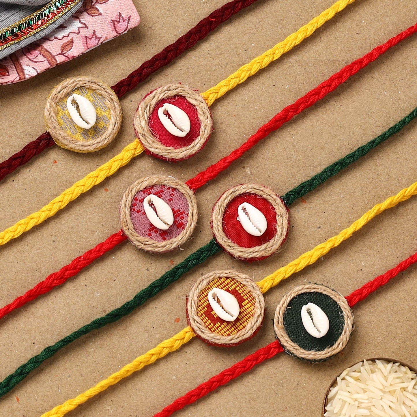 Handmade jute fabart shell work rakhi (set of 6) 153