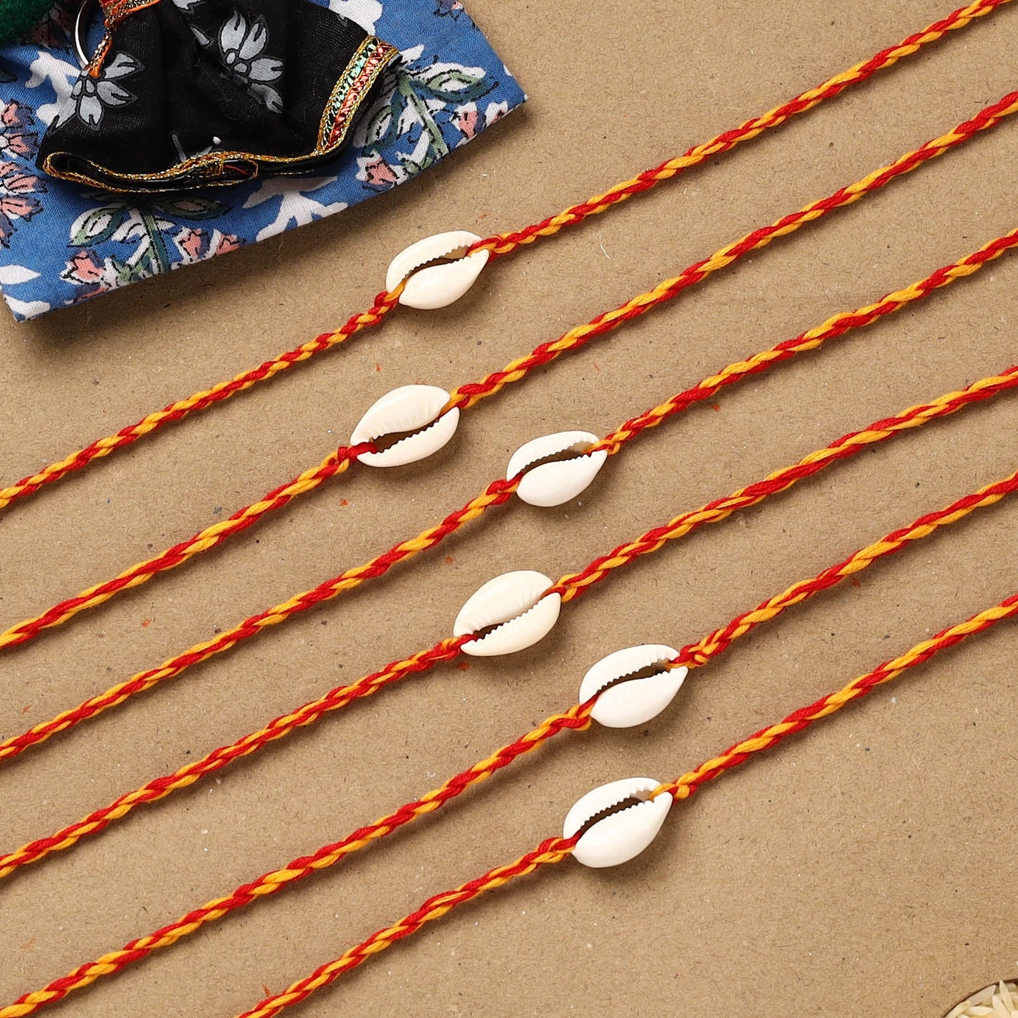 Handmade jute fabart shell work rakhi (set of 6) 156