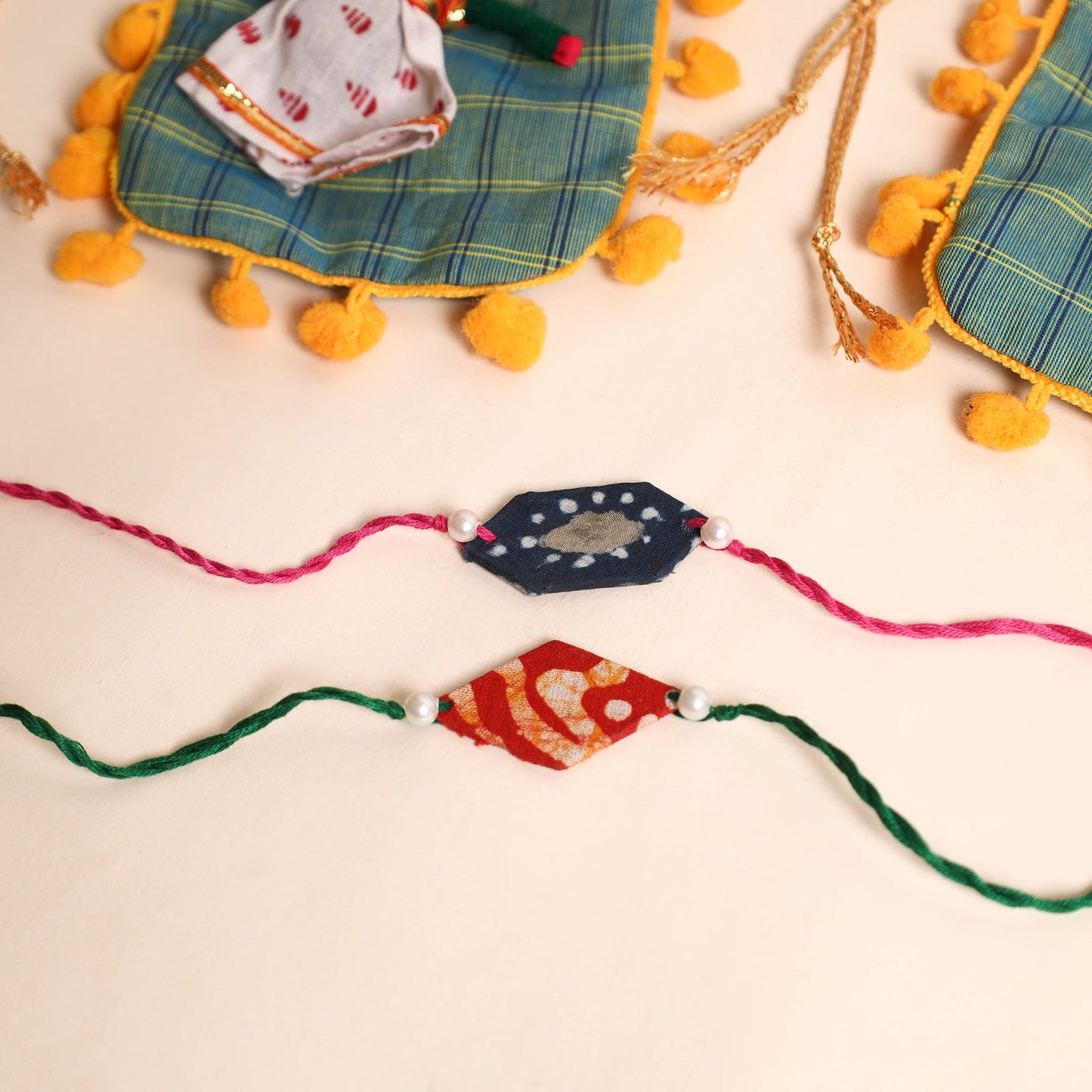 Handmade Pearl Fabric Rakhi (Set of 2)