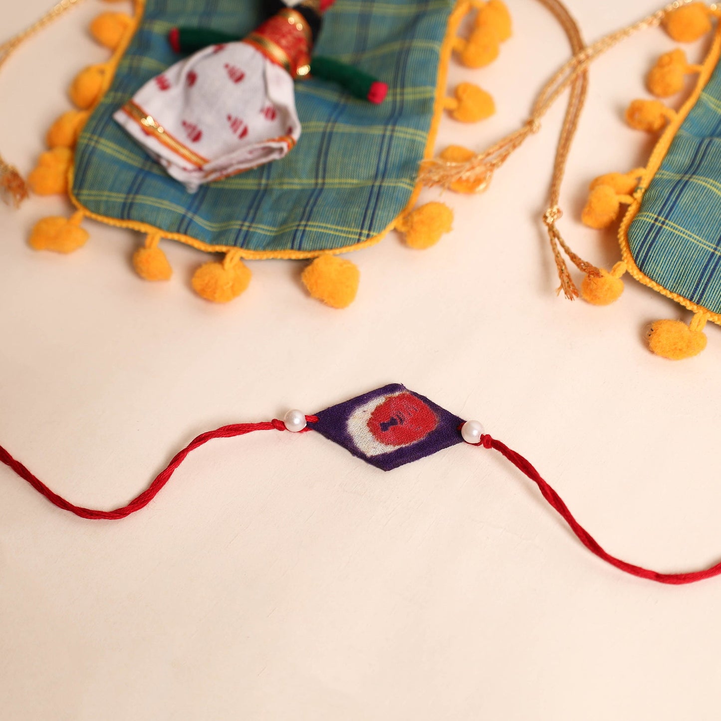 Handmade Pearl Fabric Rakhi (Set of 2)