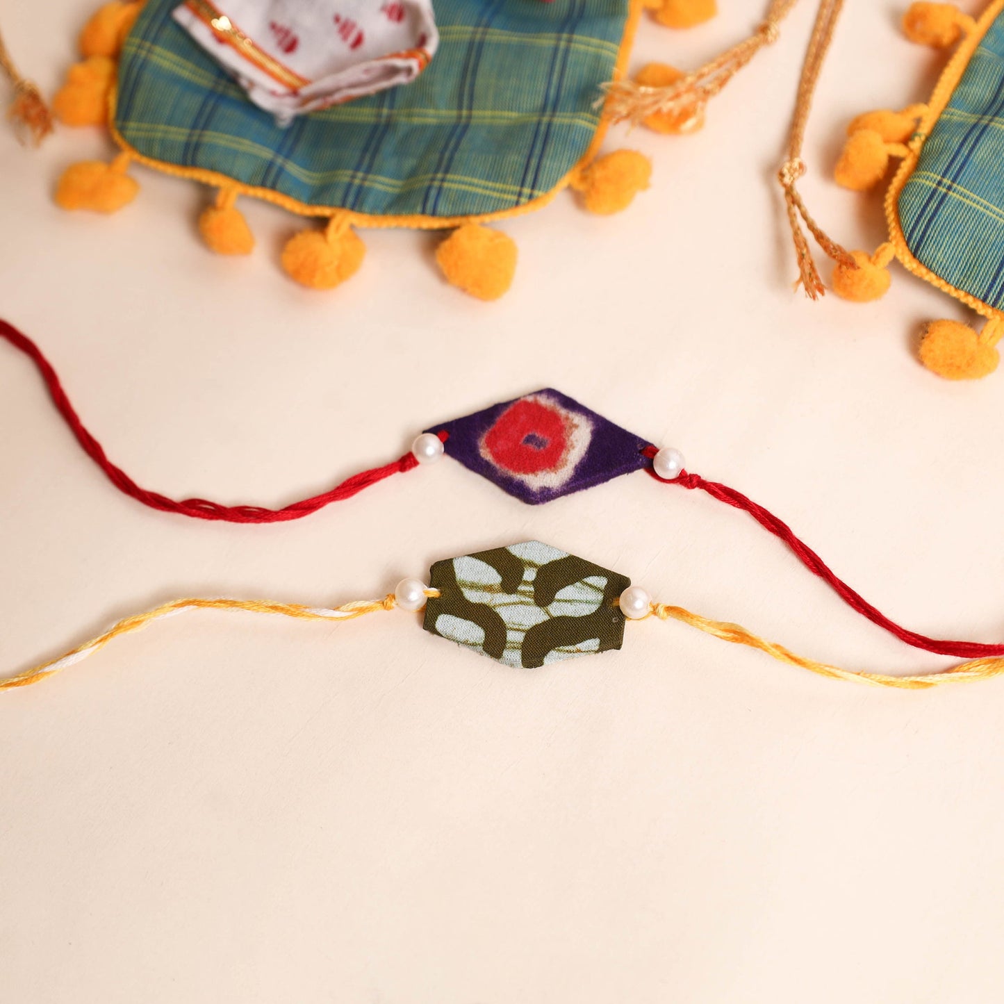 Handmade Pearl Fabric Rakhi (Set of 2)