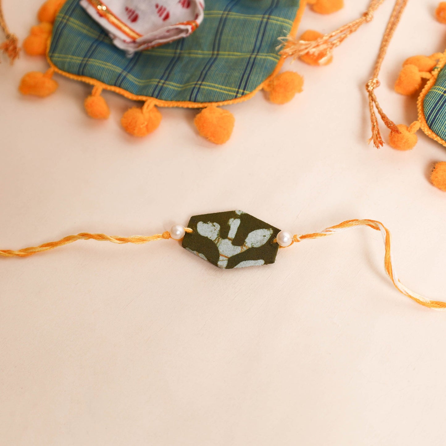 Handmade Pearl Fabric Rakhi (Set of 2)