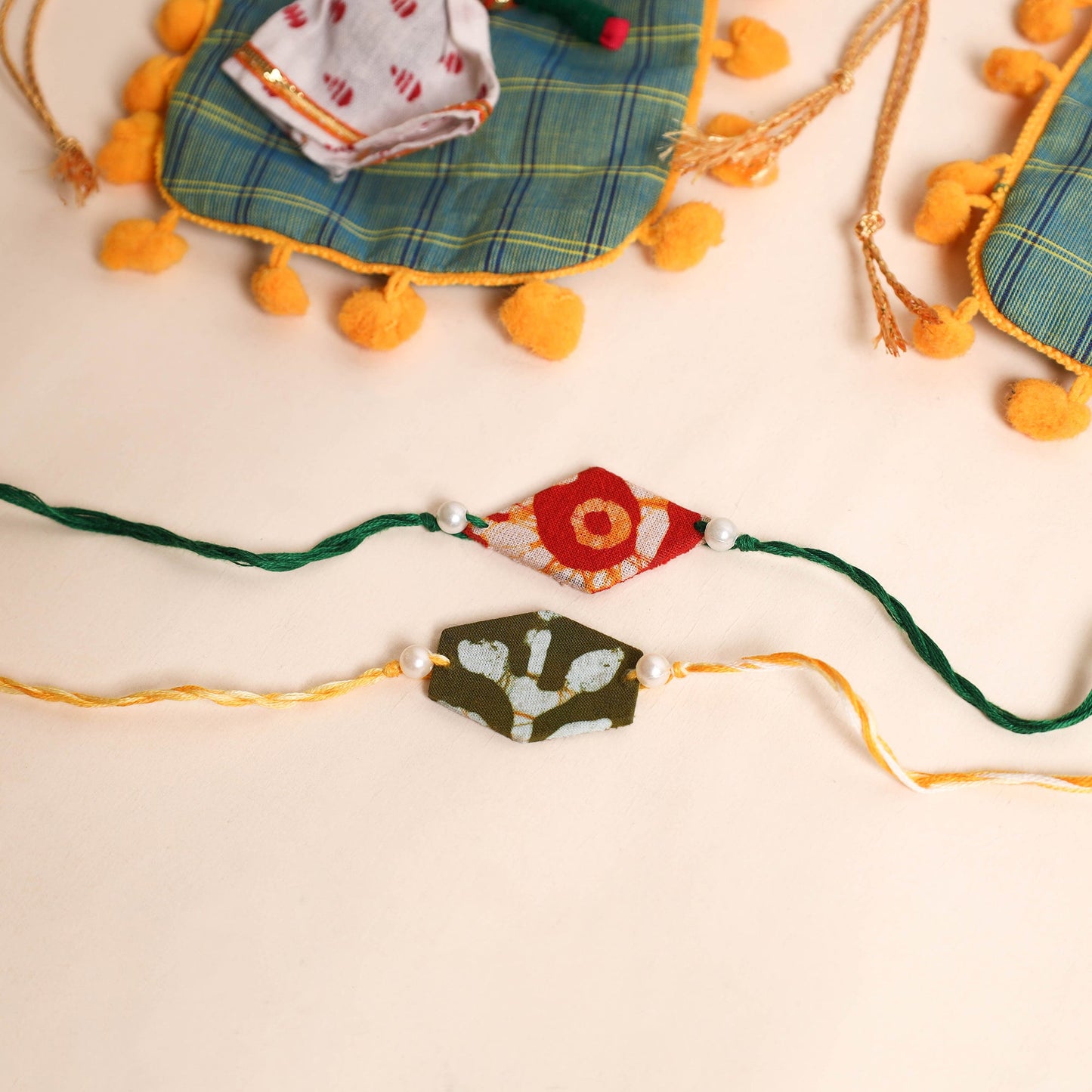 Handmade Pearl Fabric Rakhi (Set of 2)