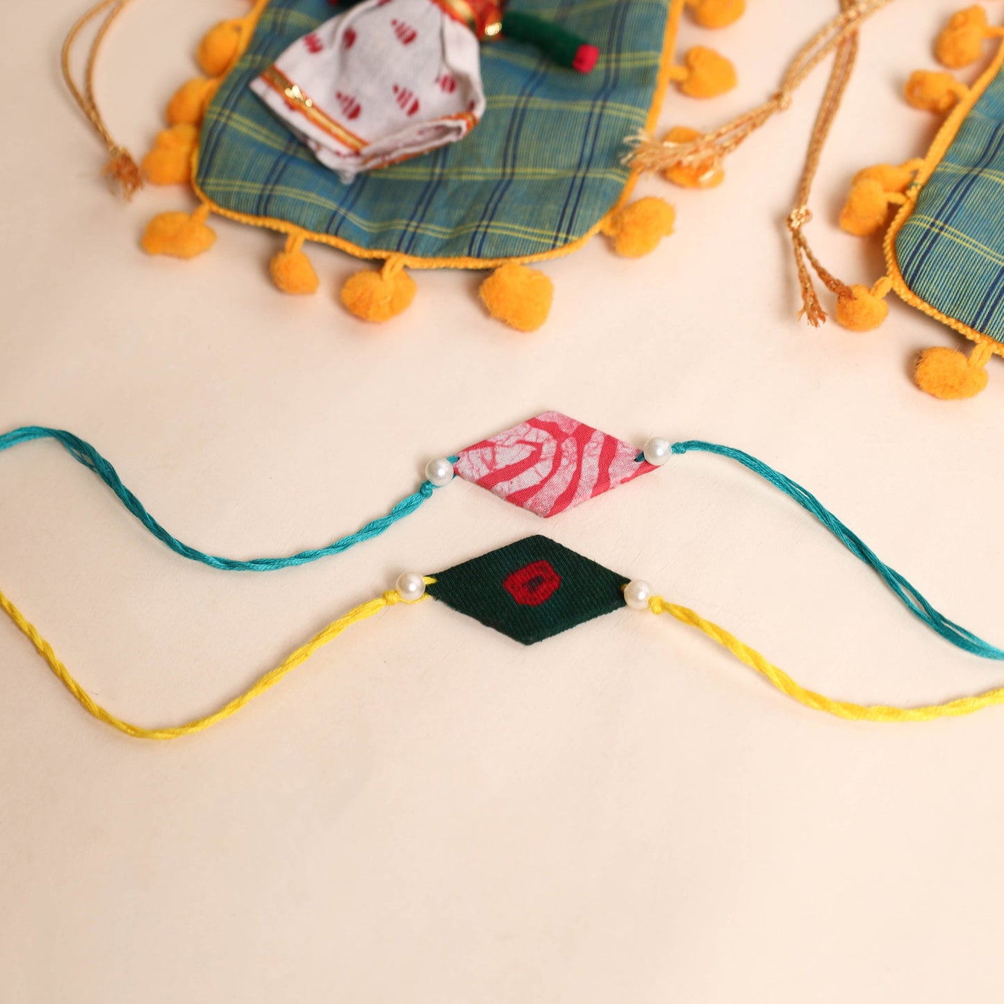 Handmade Pearl Fabric Rakhi (Set of 2)