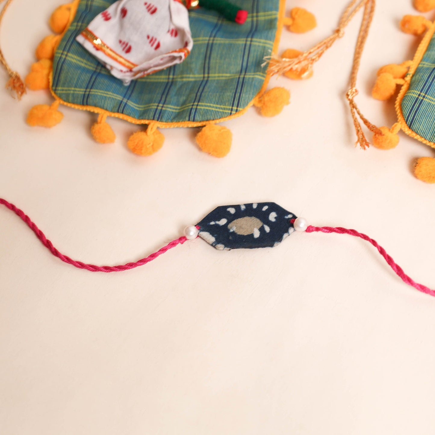 Handmade Pearl Fabric Rakhi (Set of 2)