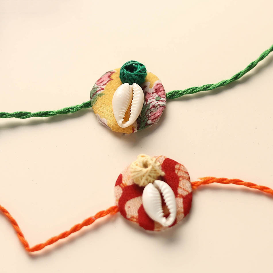 Handmade Shell Work Fabart Rakhi (Set of 2)