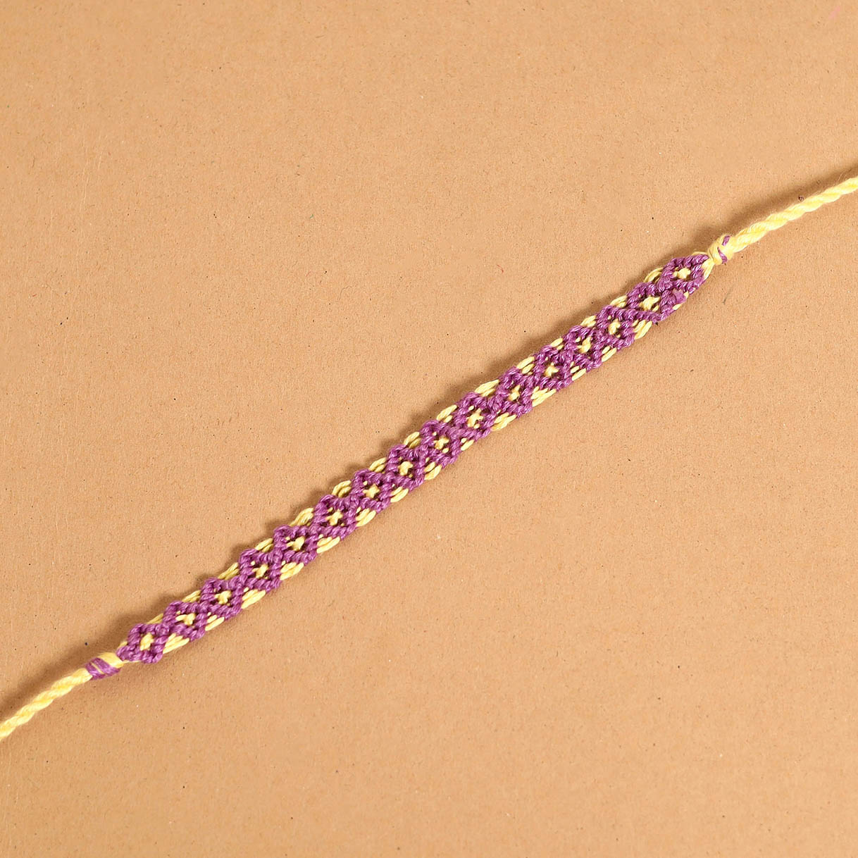Handmade Thread Work Rakhi by Kala Raksha