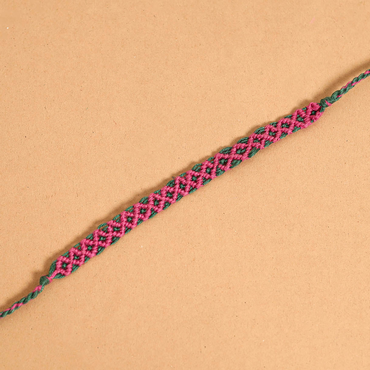 Handmade Thread Work Rakhi by Kala Raksha