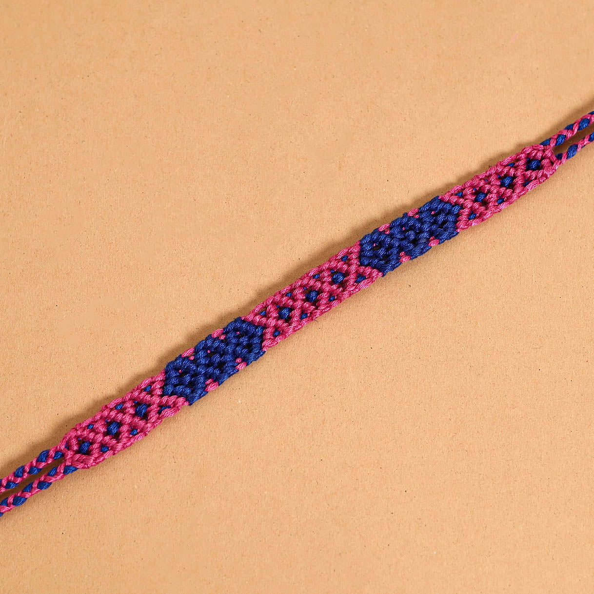 Handmade Thread Work Rakhi by Kala Raksha