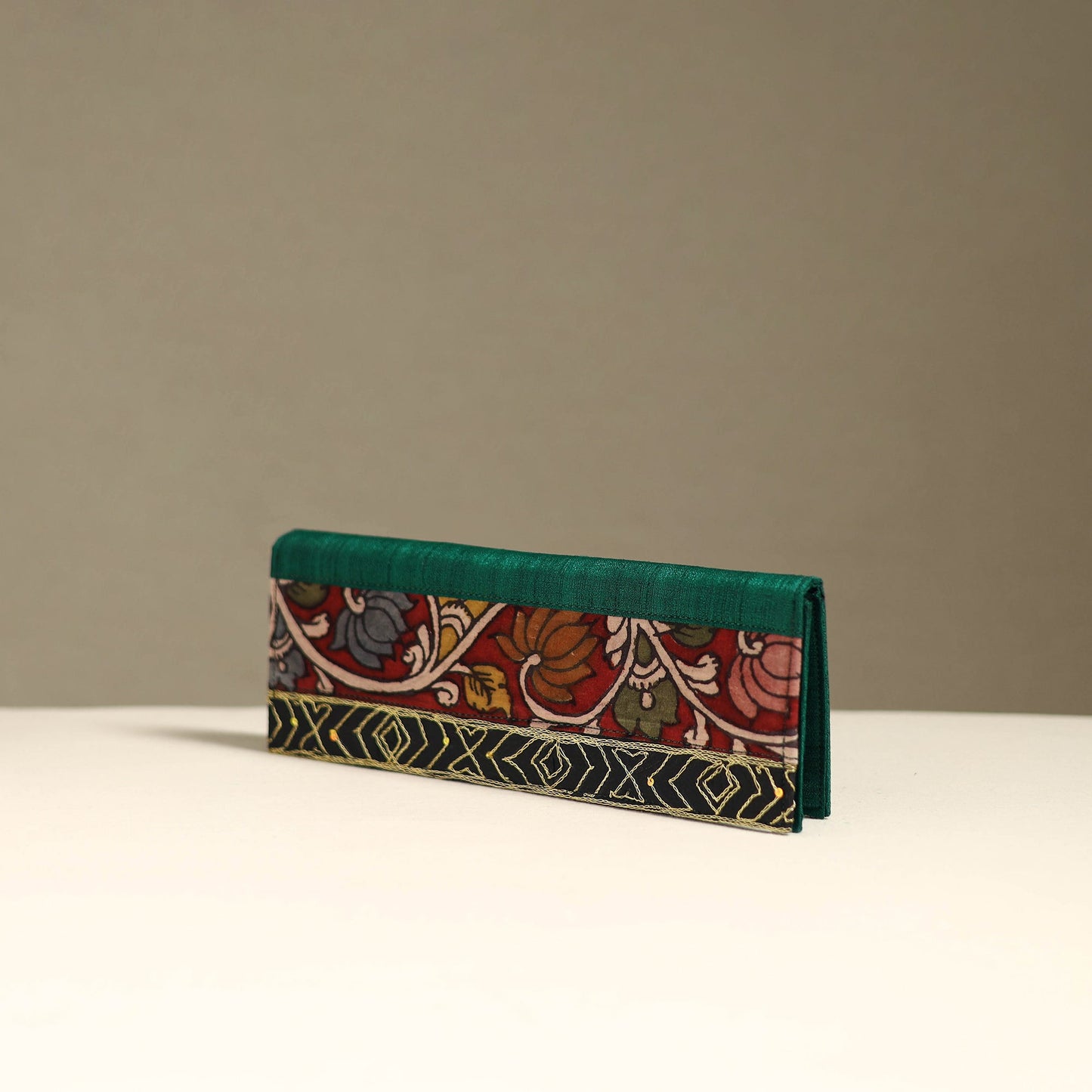 Handpainted kalamkari natural dyed ghicha silk clutch
