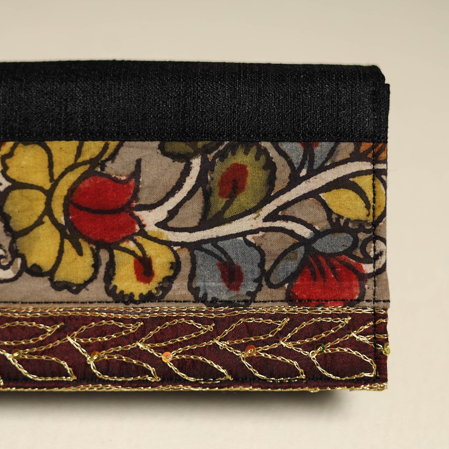 Handpainted kalamkari natural dyed ghicha silk clutch