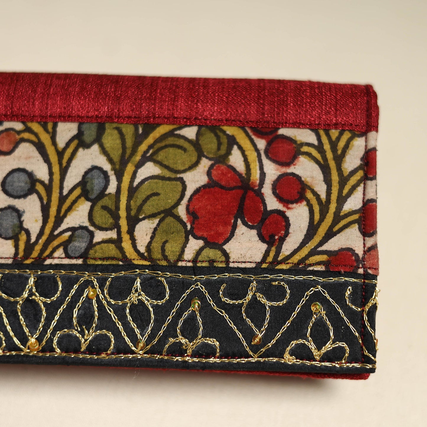 Handpainted kalamkari natural dyed ghicha silk clutch