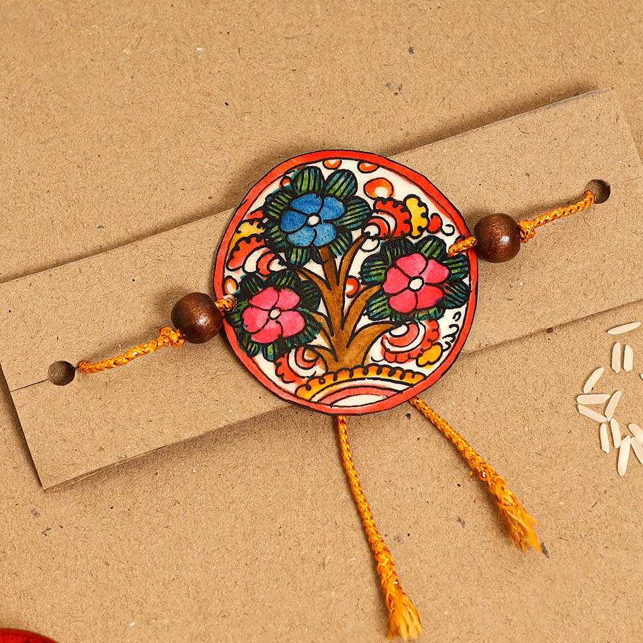 Handpainted Tholu Bommalata Leather Rakhi