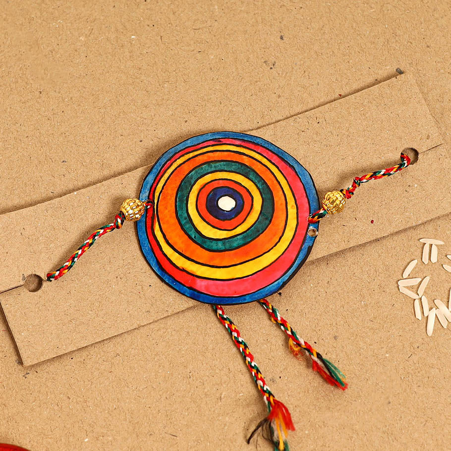 Handpainted Tholu Bommalata Leather Rakhi