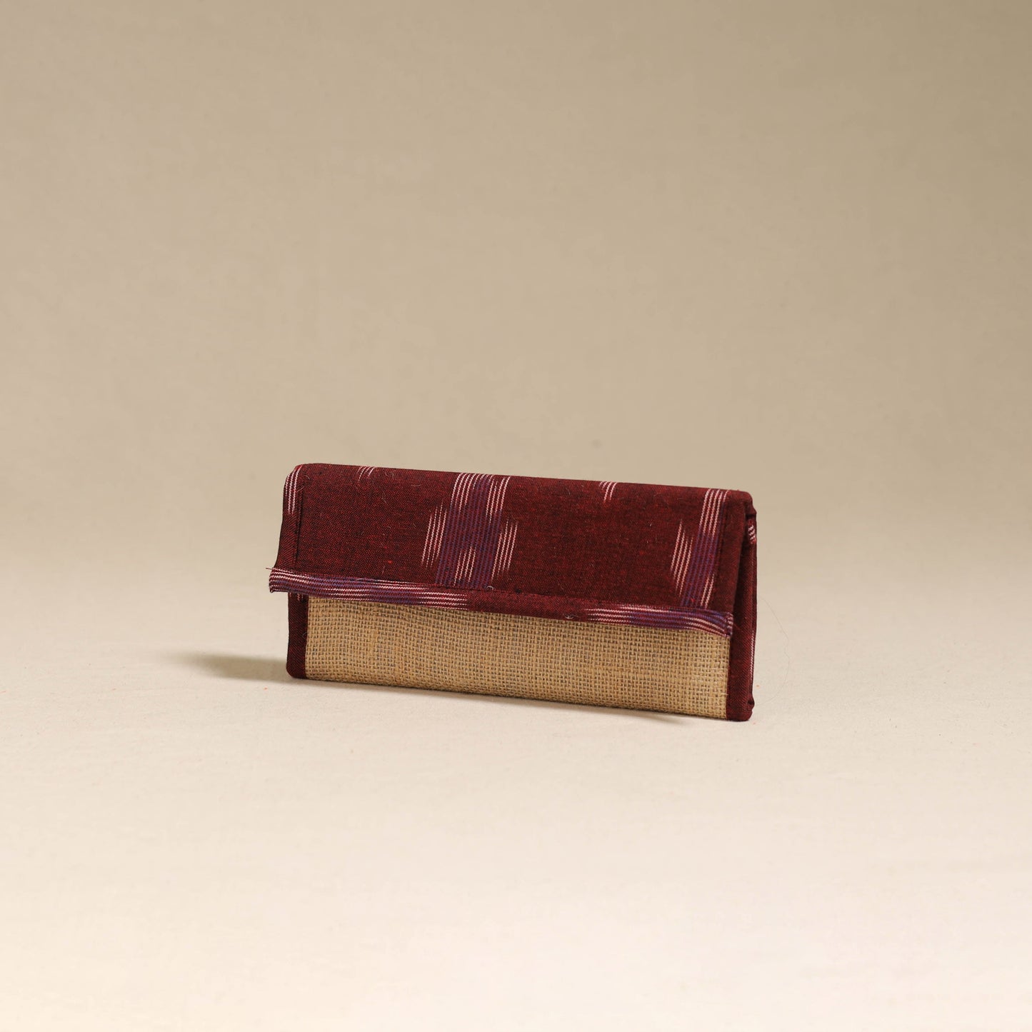 Maroon - handcrafted ikat fabric jute clutch / wallet