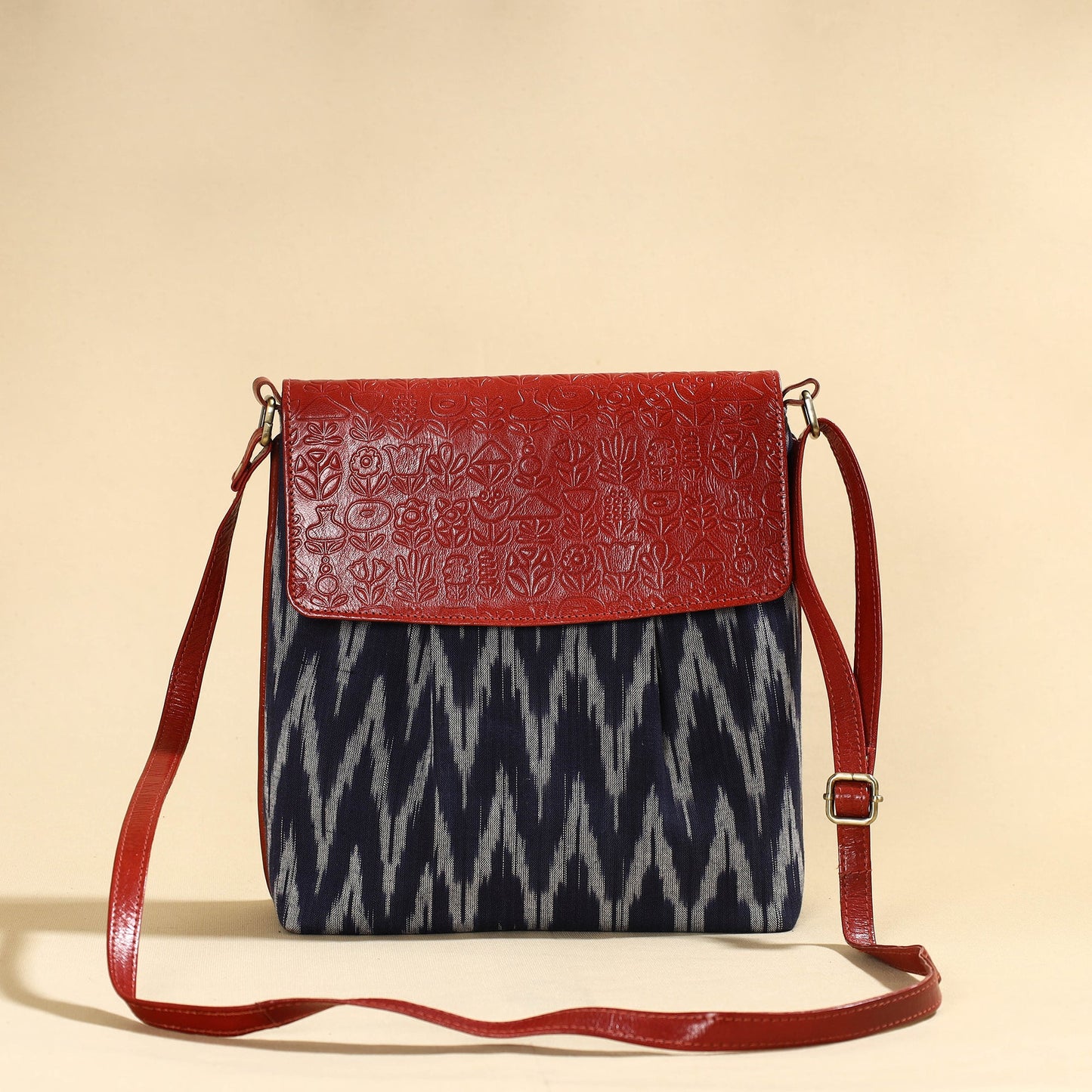 Handcrafted Ikat Fabric Sling Bag with Embossed Leather Flap