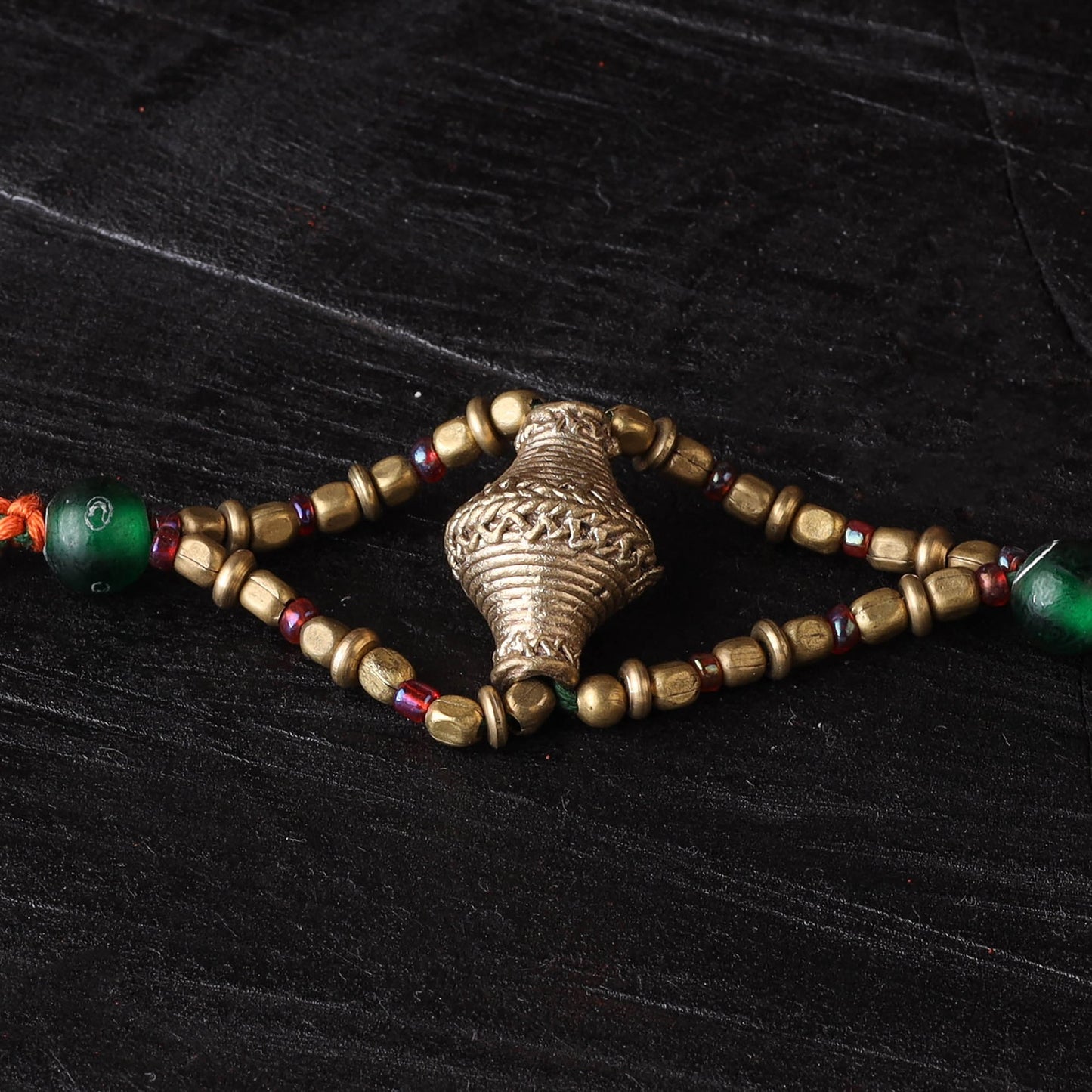 Handcrafted tribal dokra brass thread rakhi 25