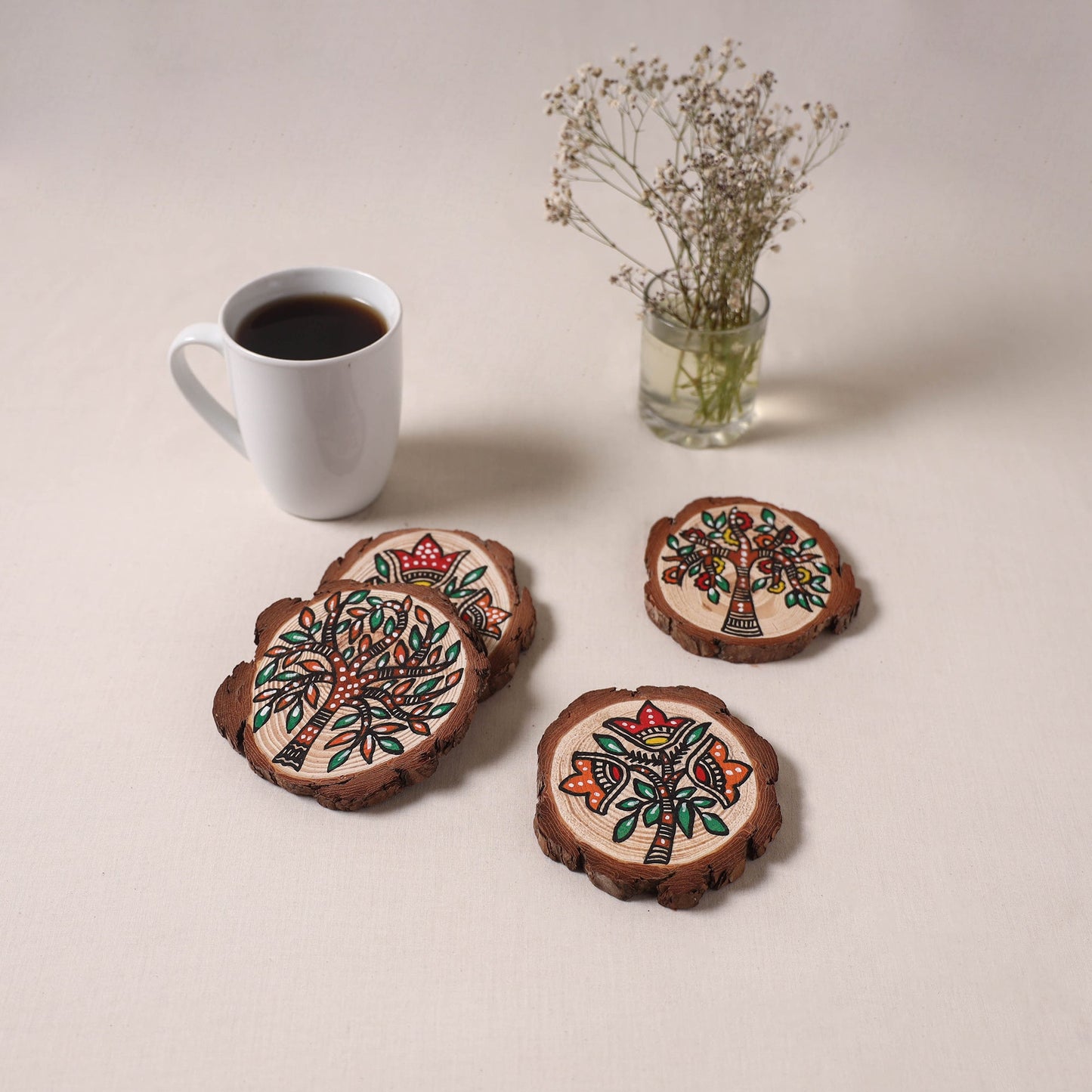 Madhubani handpainted pine wood coaster (set of 4) 09