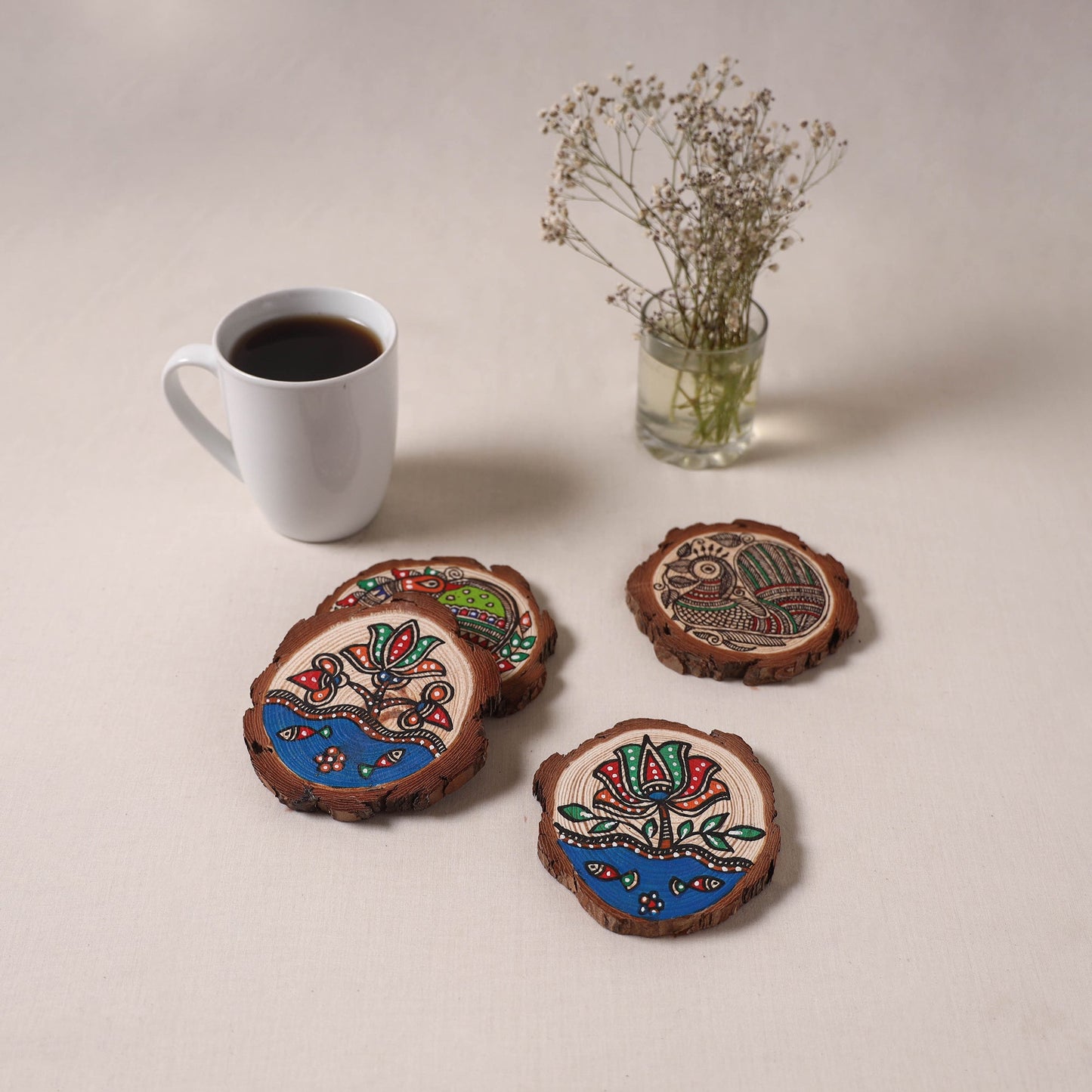 Madhubani handpainted pine wood coaster (set of 4) 11