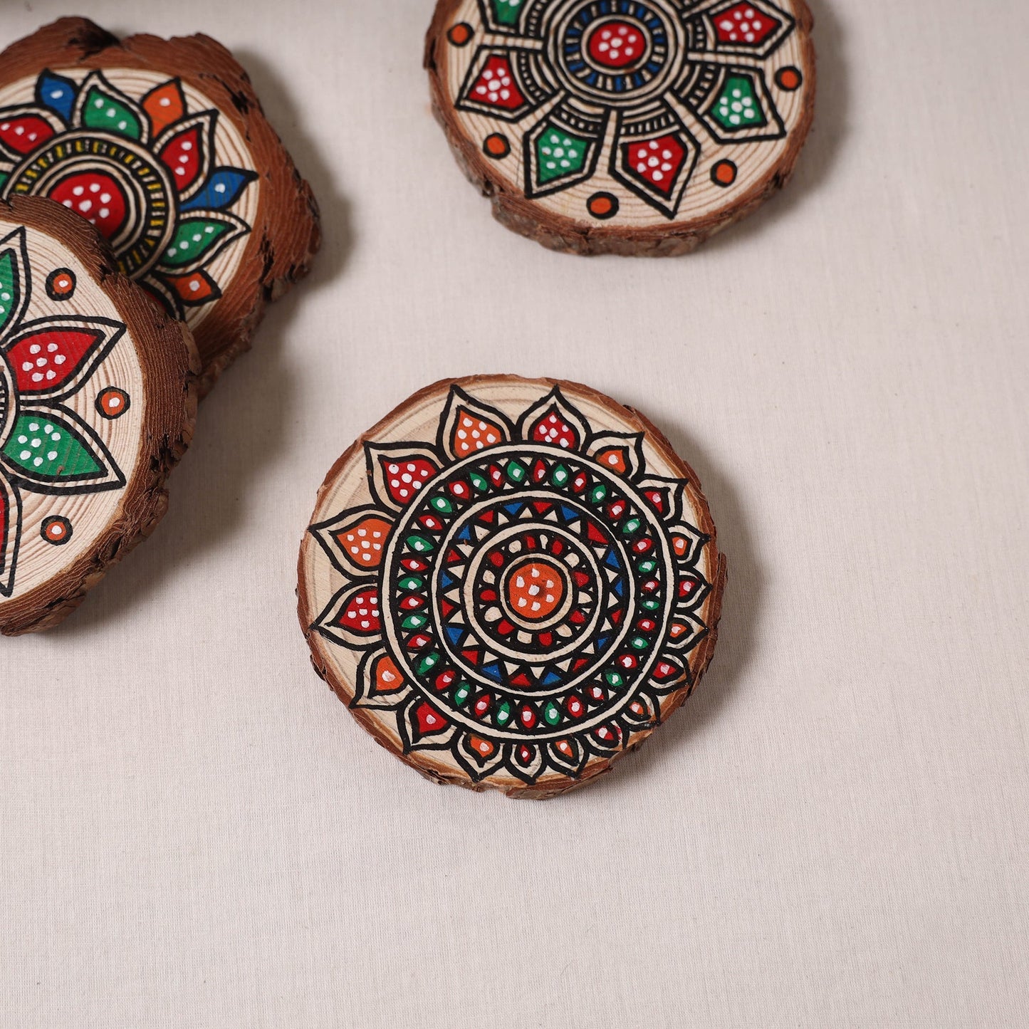 Madhubani handpainted pine wood coaster (set of 4) 12