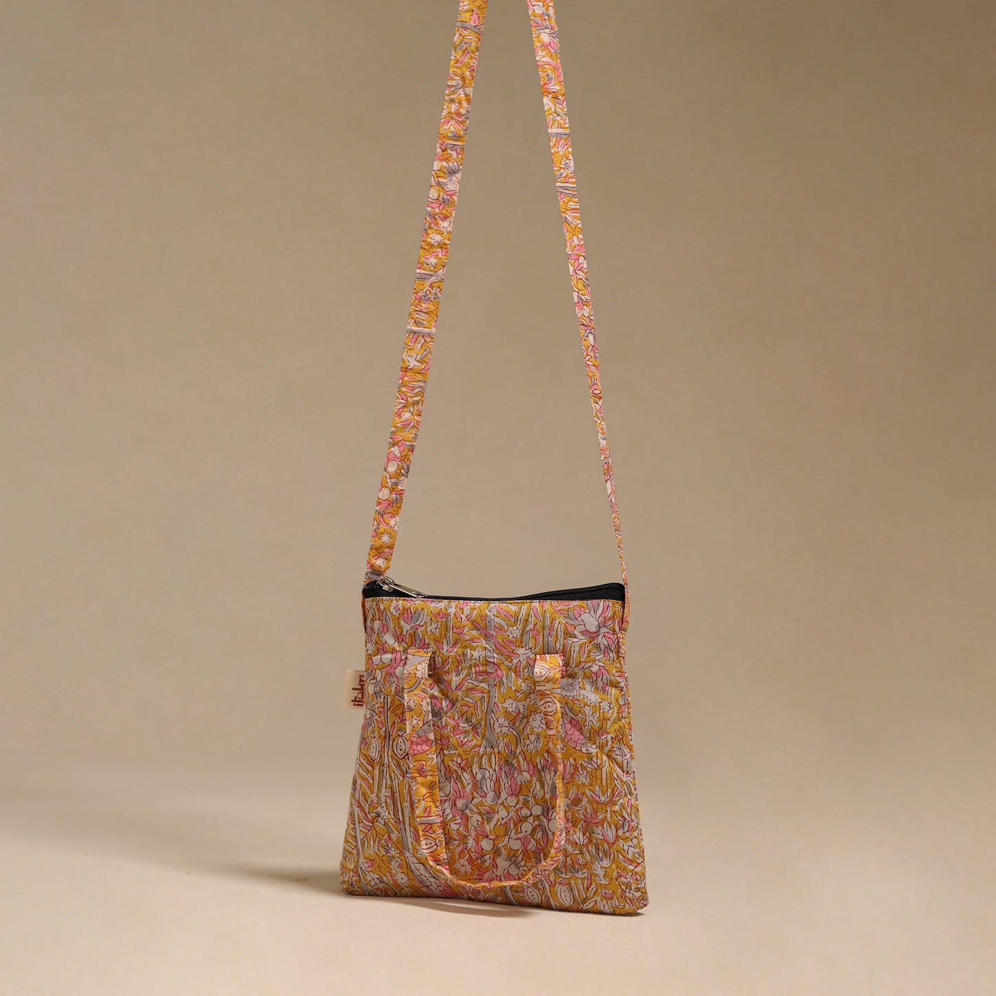 Handcrafted quilted sling bag 02