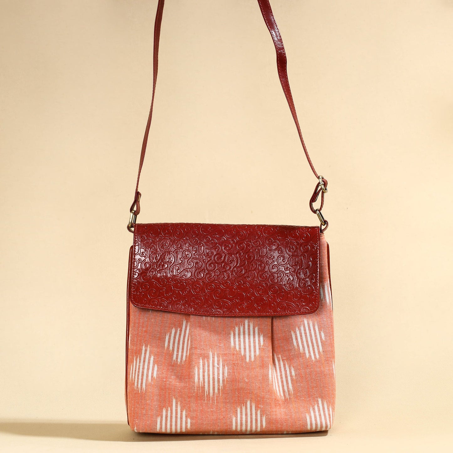 Handcrafted Ikat Fabric Sling Bag with Embossed Leather Flap