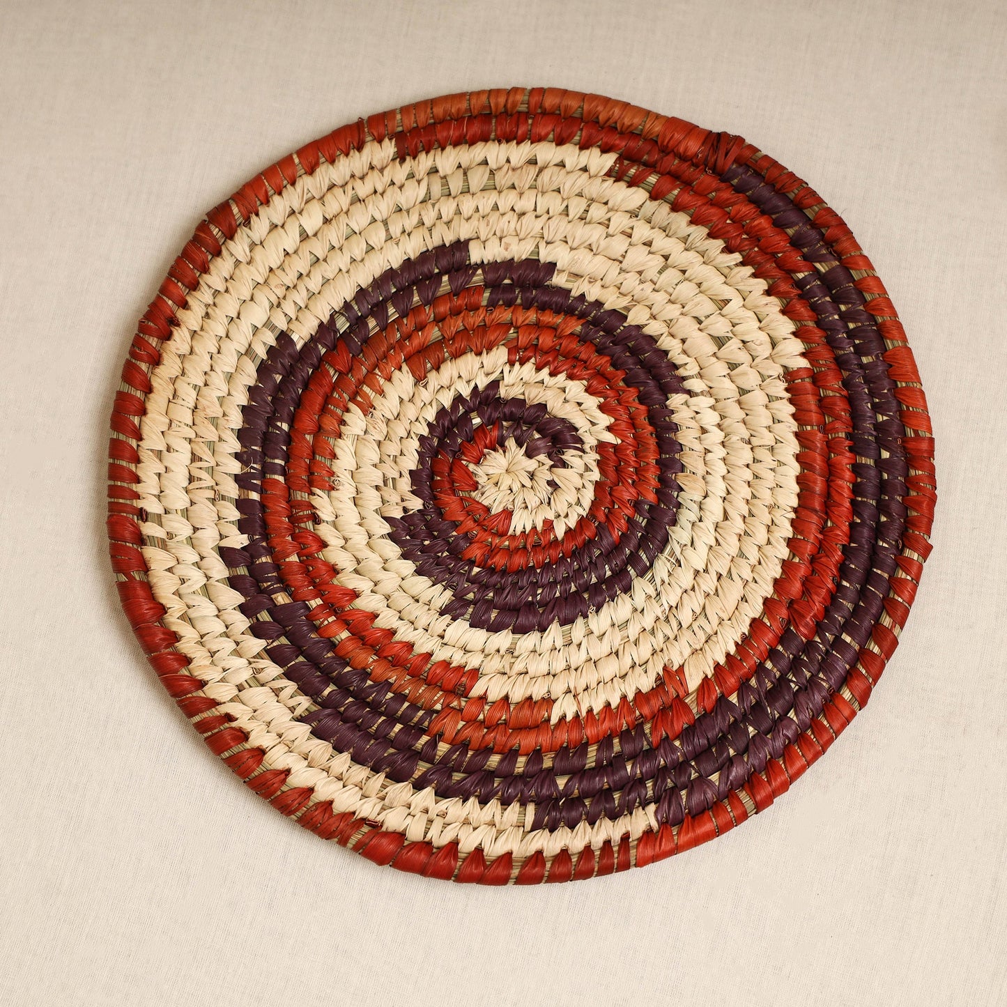 Red - handcrafted eco-friendly sabai grass spiral mat 12
