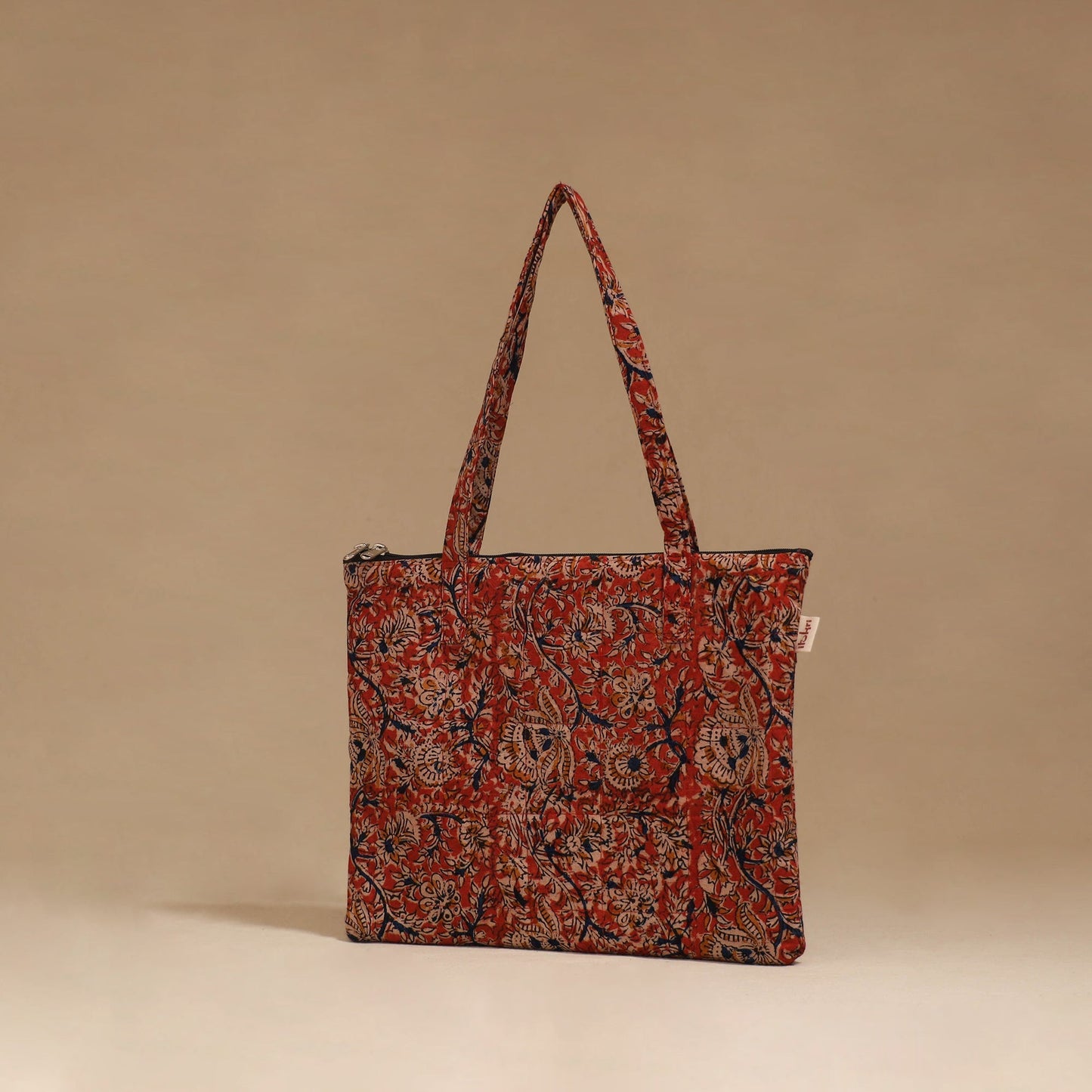 Handcrafted quilted handbag 17