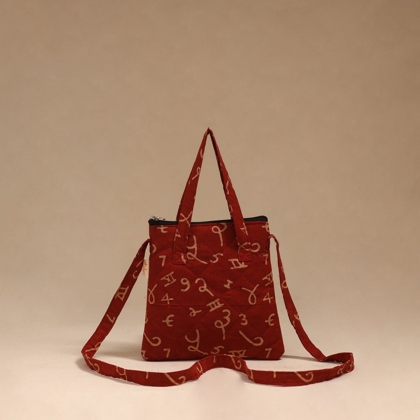 Handcrafted quilted sling bag 34