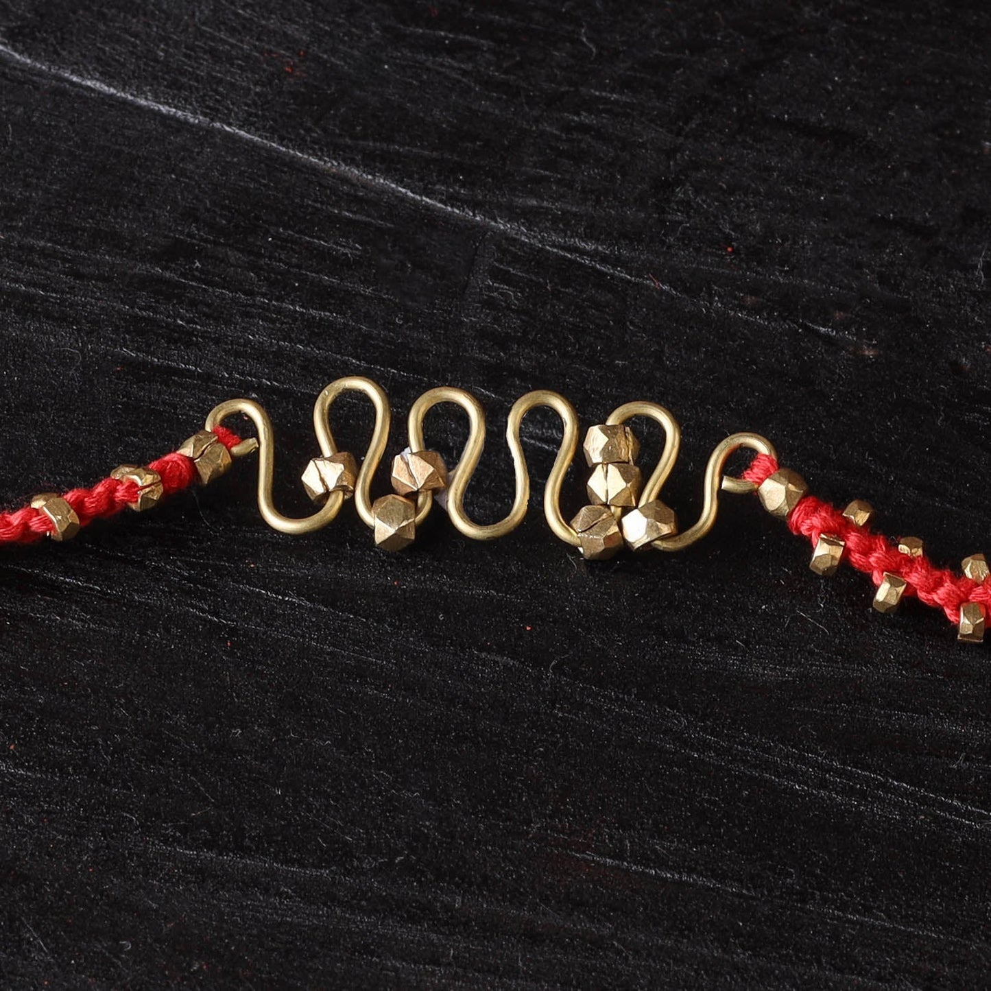 Handcrafted tribal dokra brass thread rakhi 11