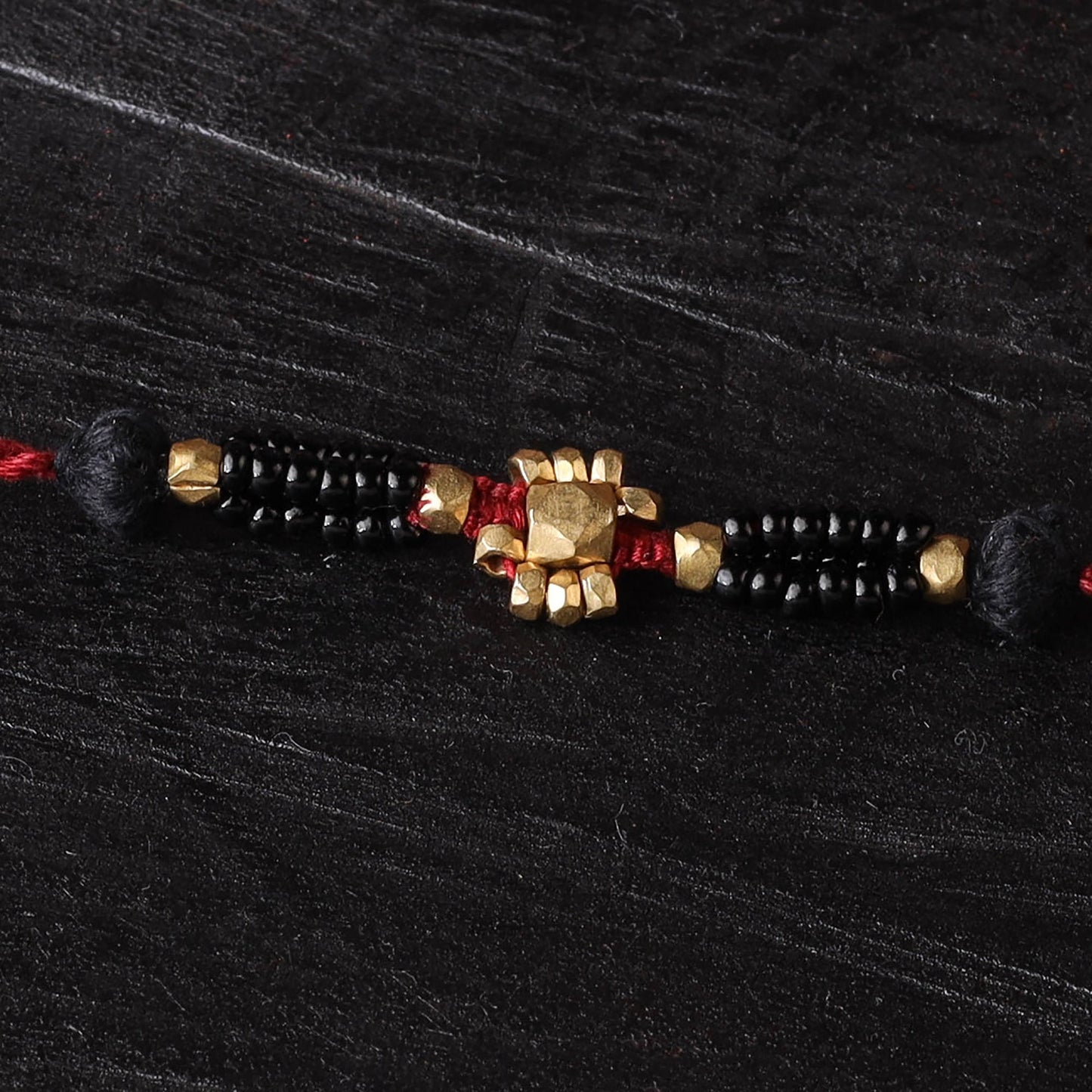 Handcrafted tribal dokra brass thread rakhi 38