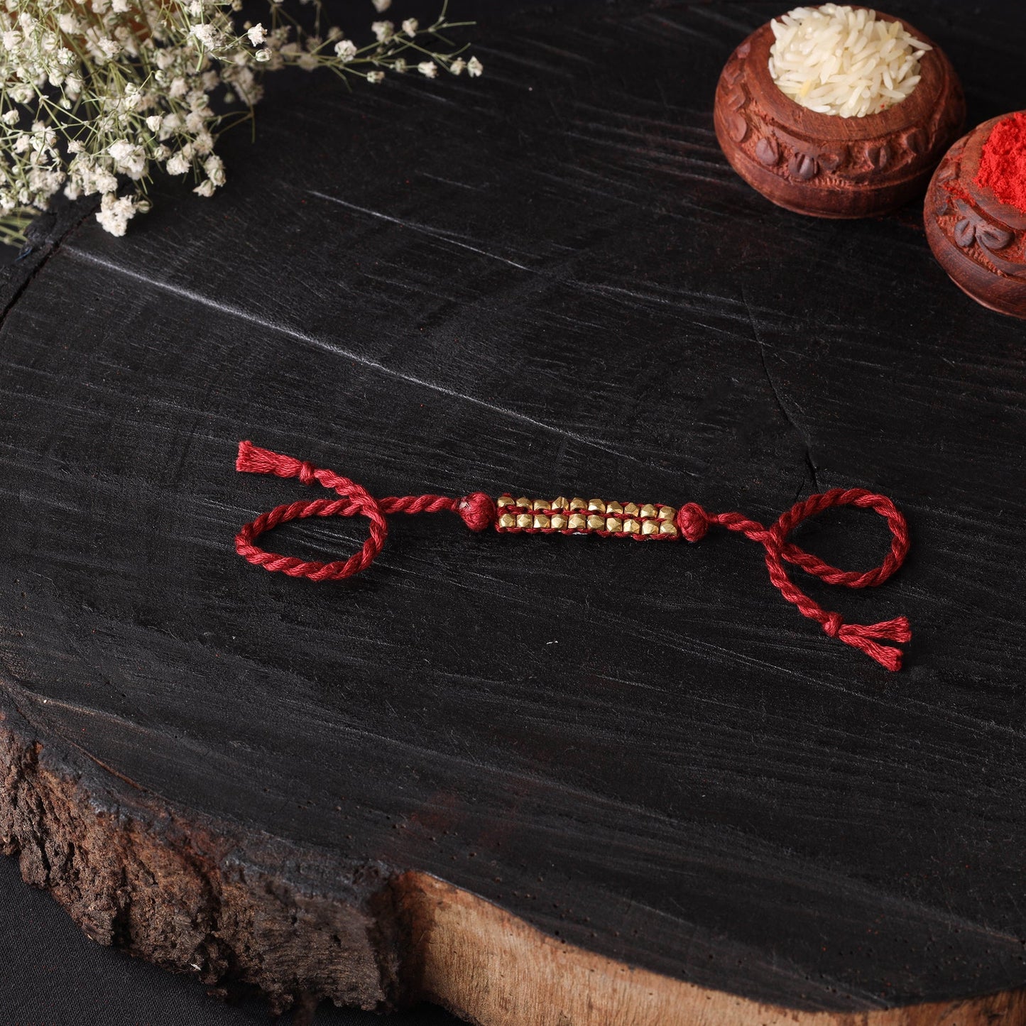Handcrafted tribal dokra brass thread rakhi 43
