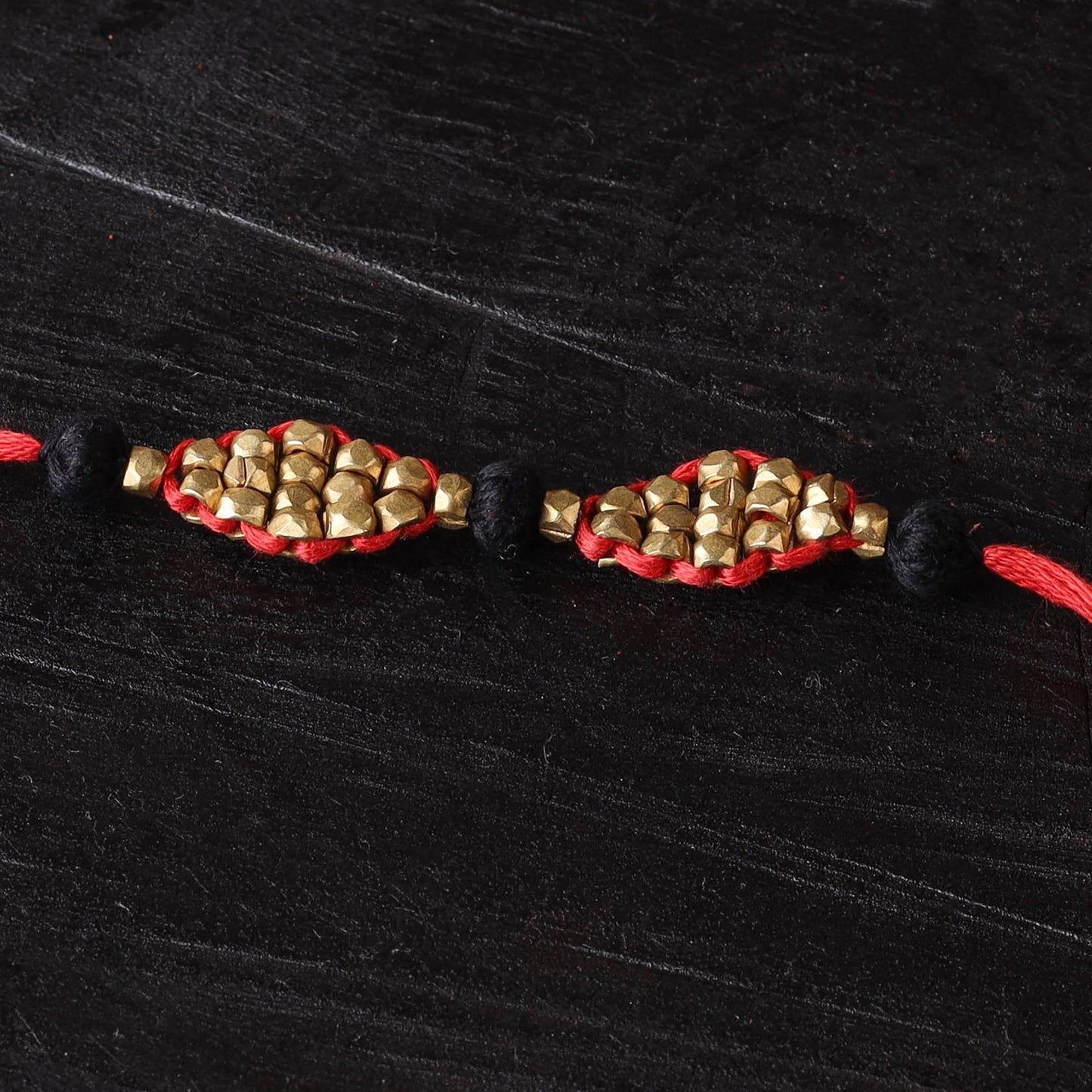 Handcrafted tribal dokra brass thread rakhi 46