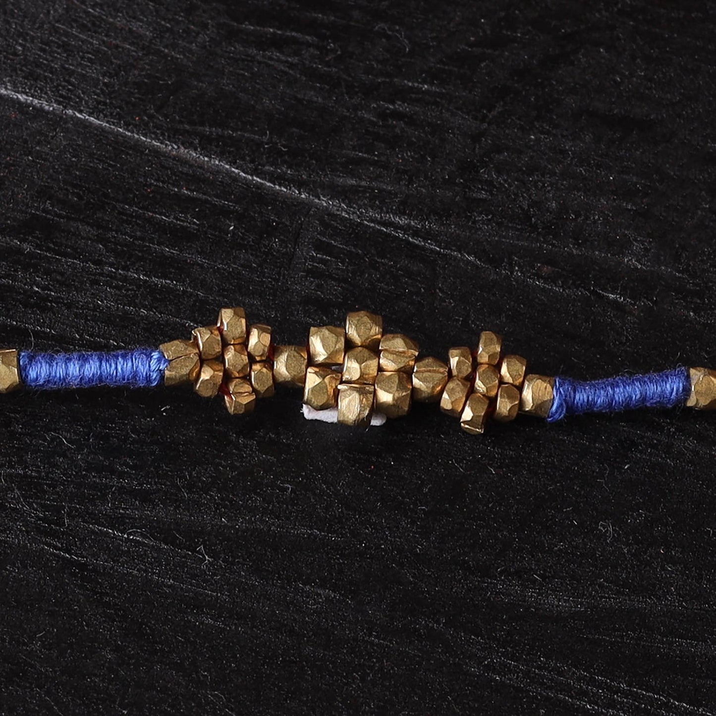 Handcrafted tribal dokra brass thread rakhi 51