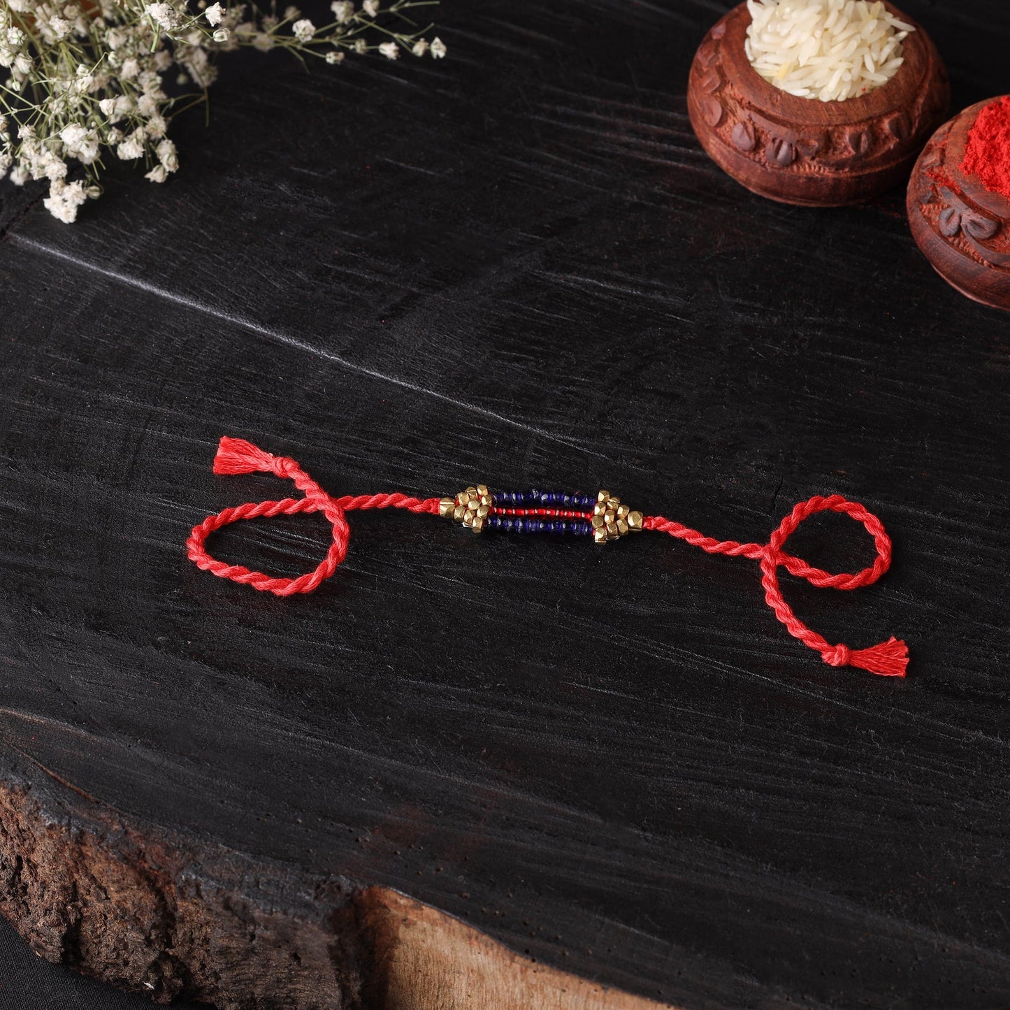 Handcrafted tribal dokra brass thread rakhi 52