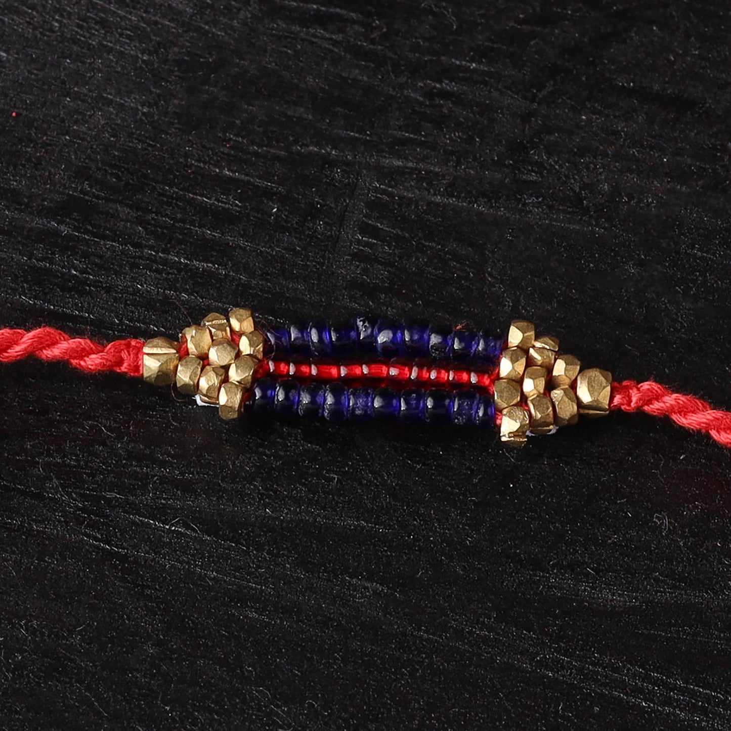 Handcrafted tribal dokra brass thread rakhi 52
