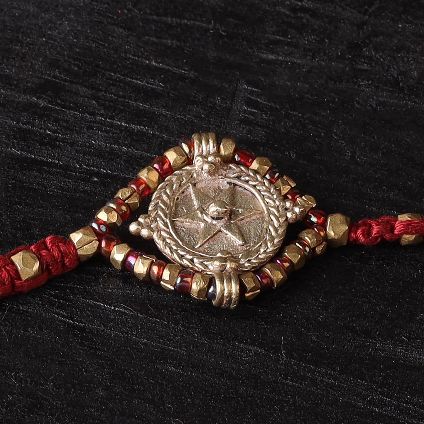 Handcrafted tribal dokra brass thread rakhi 53