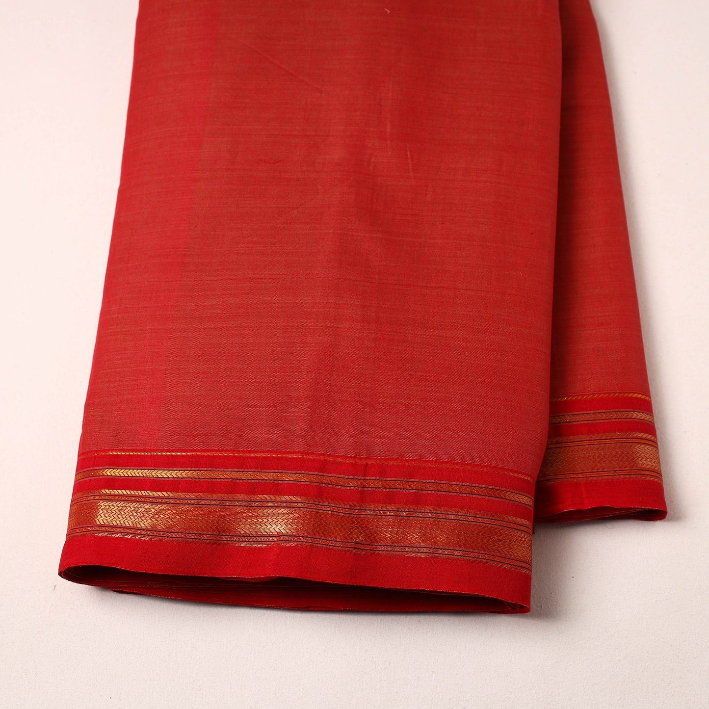 Red Mercerised Cotton Thread Border Dharwad Fabric