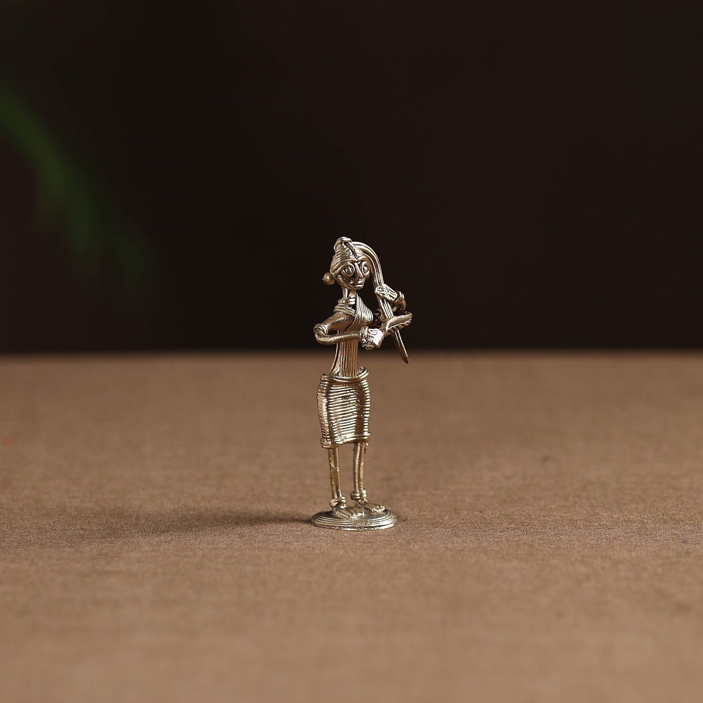 Standing lady with combing hair tribal odisha dokra art