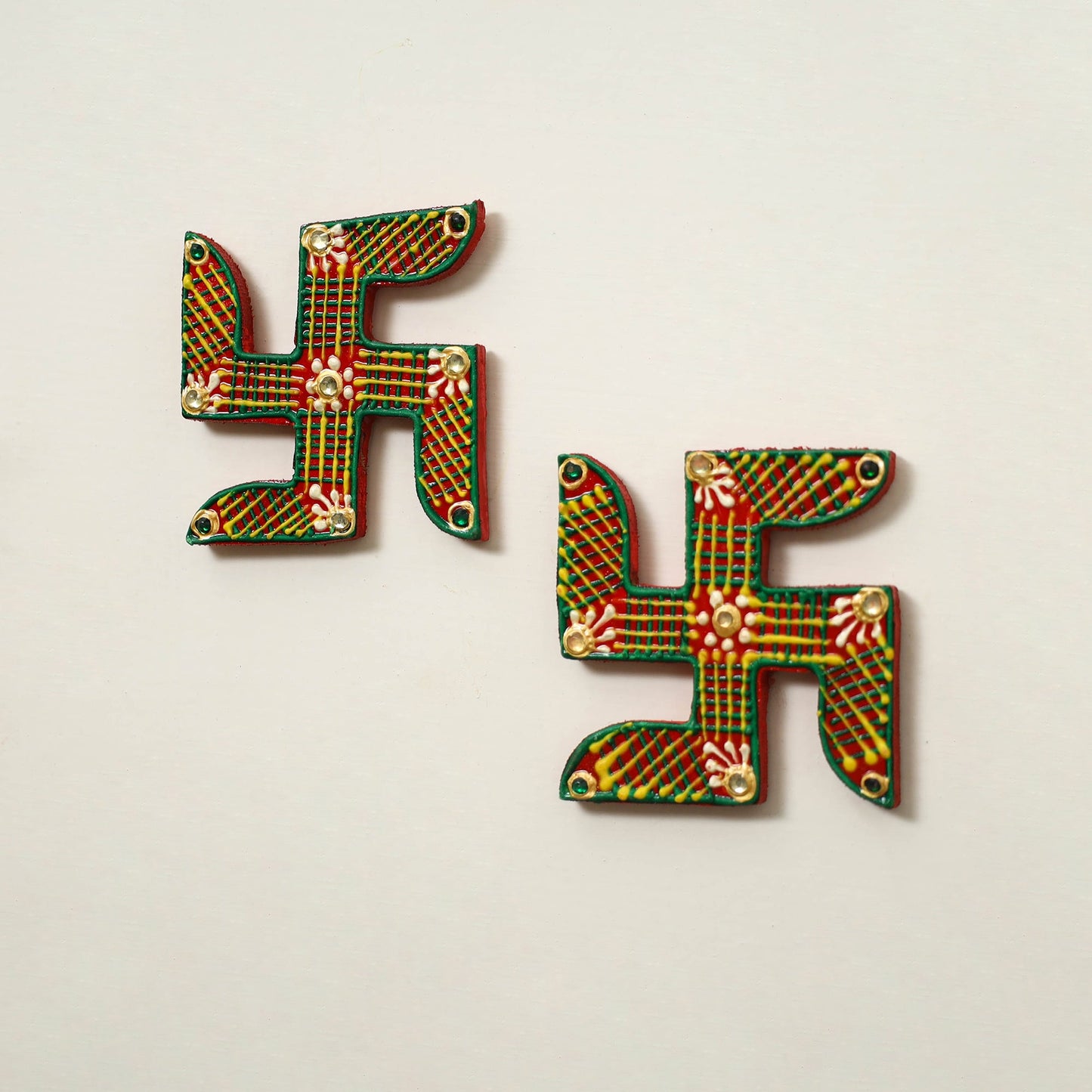 Traditional handpainted wooden swastik (pair) 21