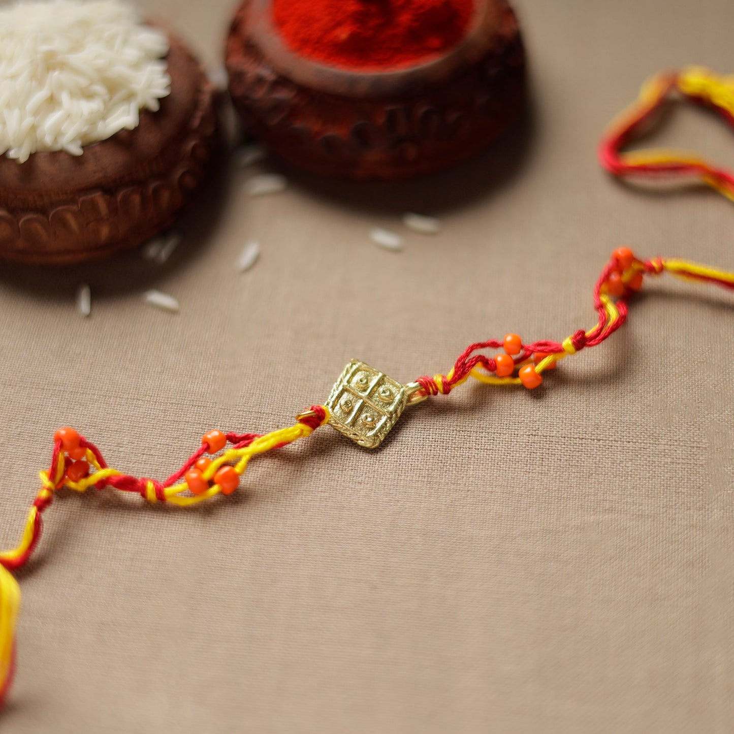 Tribal Dokra Craft Reusable Brass Rakhi by Miharu 14
