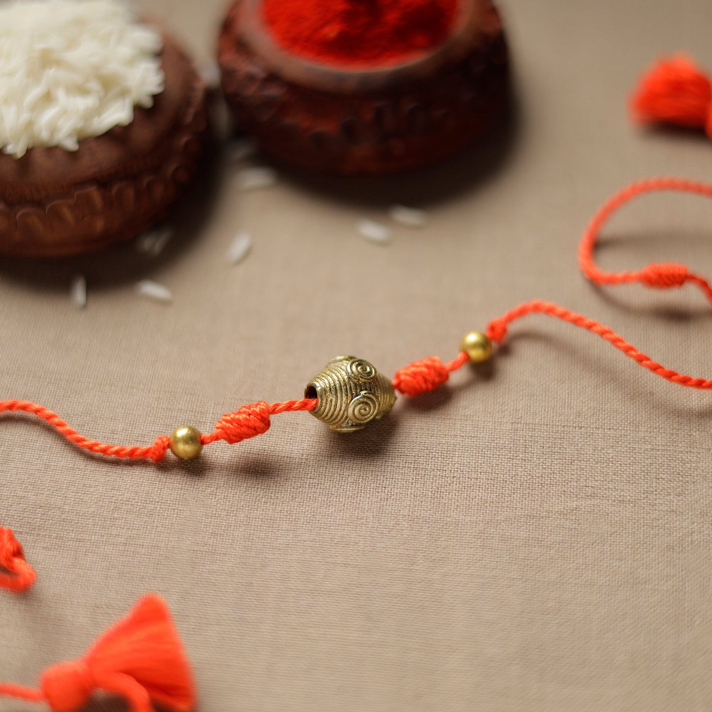 Tribal Dokra Craft Reusable Brass Rakhi by Miharu 15