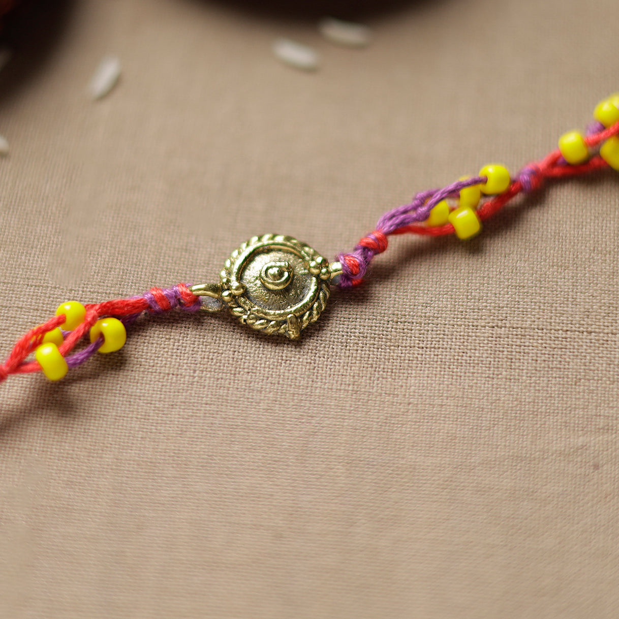 Tribal Dokra Craft Reusable Brass Rakhi by Miharu 16