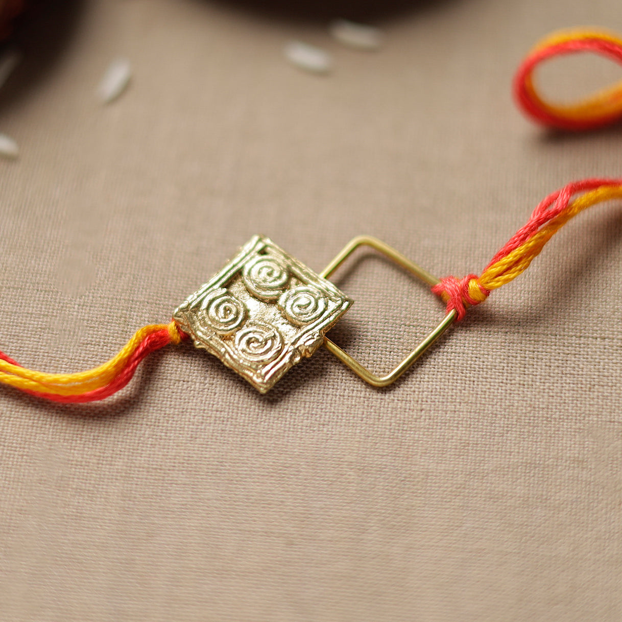 Tribal Dokra Craft Reusable Brass Rakhi by Miharu 23