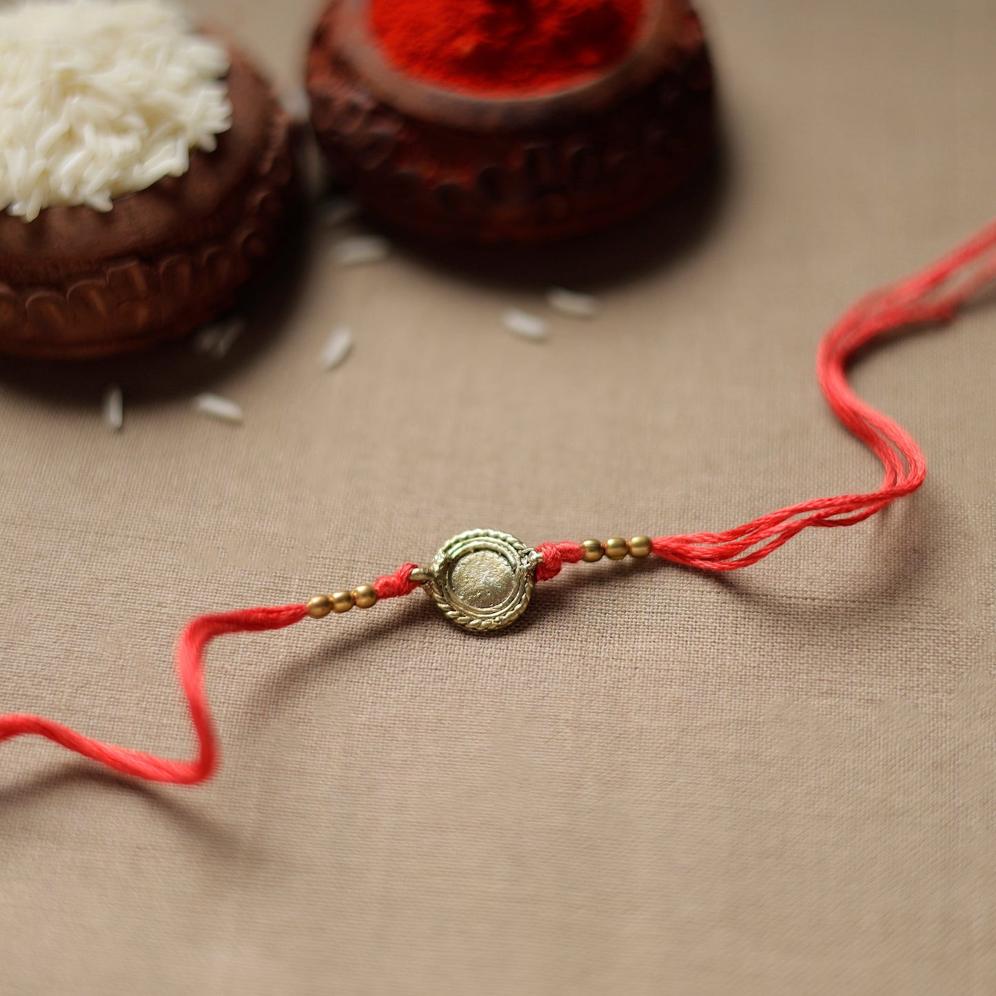 Tribal Dokra Craft Reusable Brass Rakhi by Miharu 25
