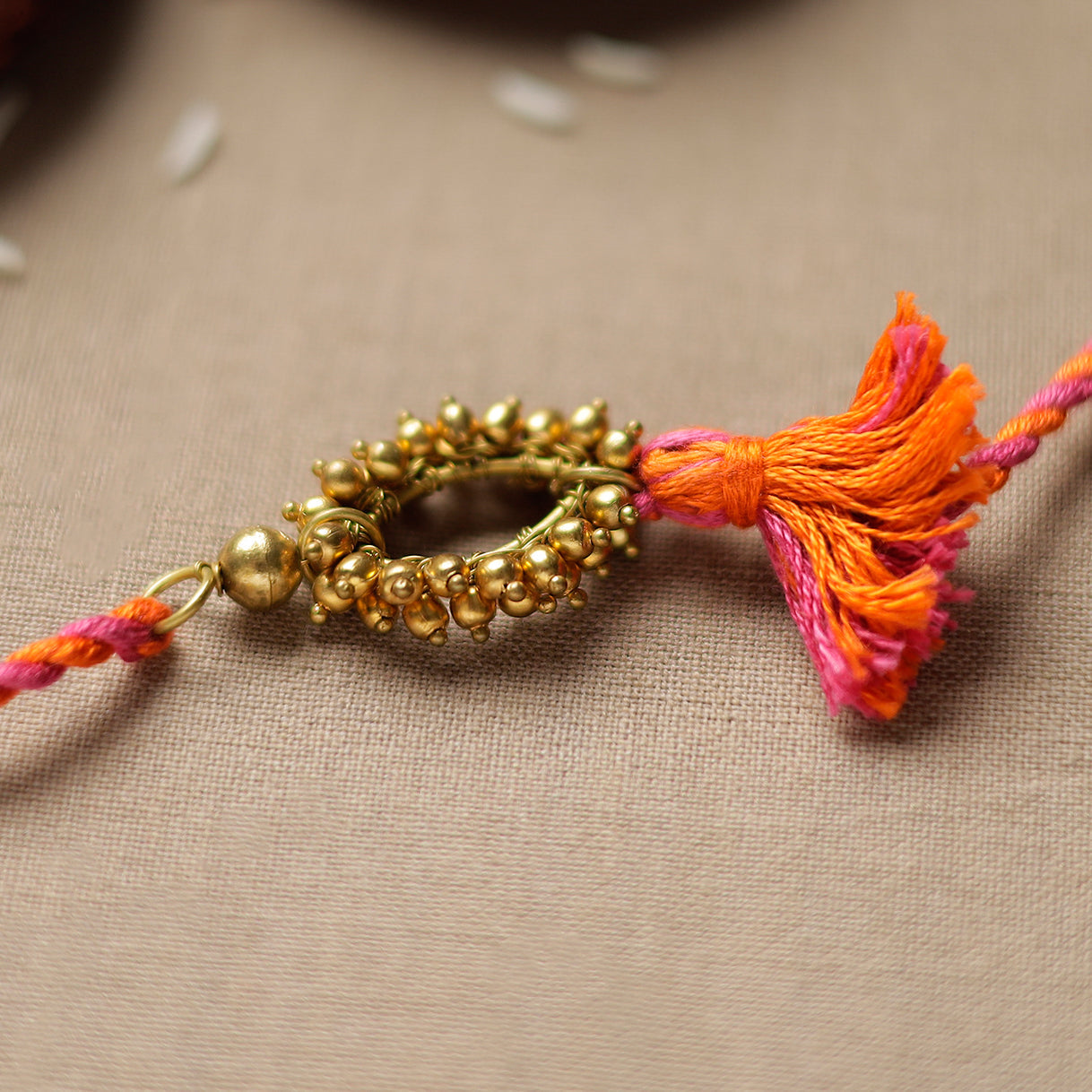 Tribal Dokra Craft Brass Rakhi by Miharu 31