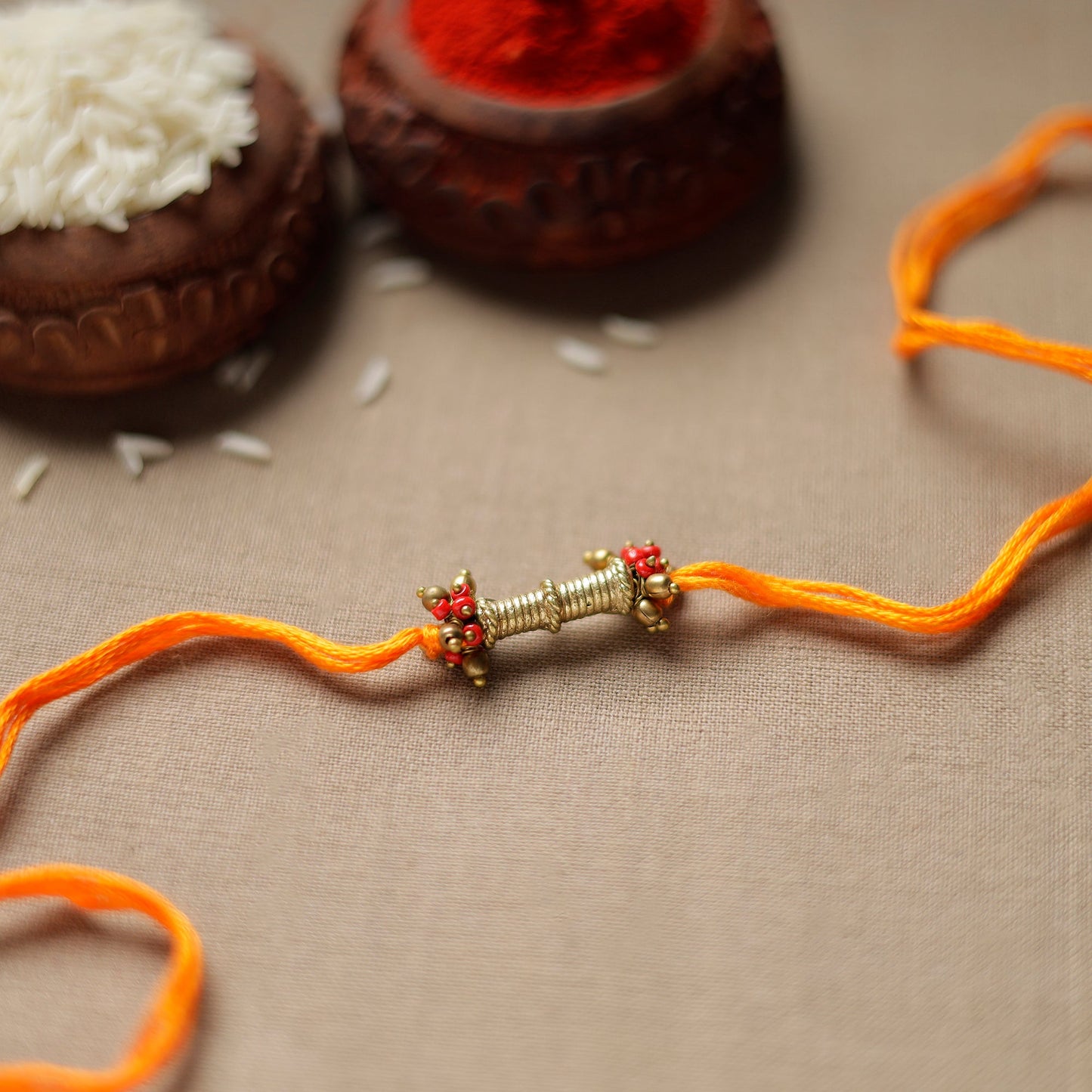 Tribal Dokra Craft Brass Rakhi by Miharu 33
